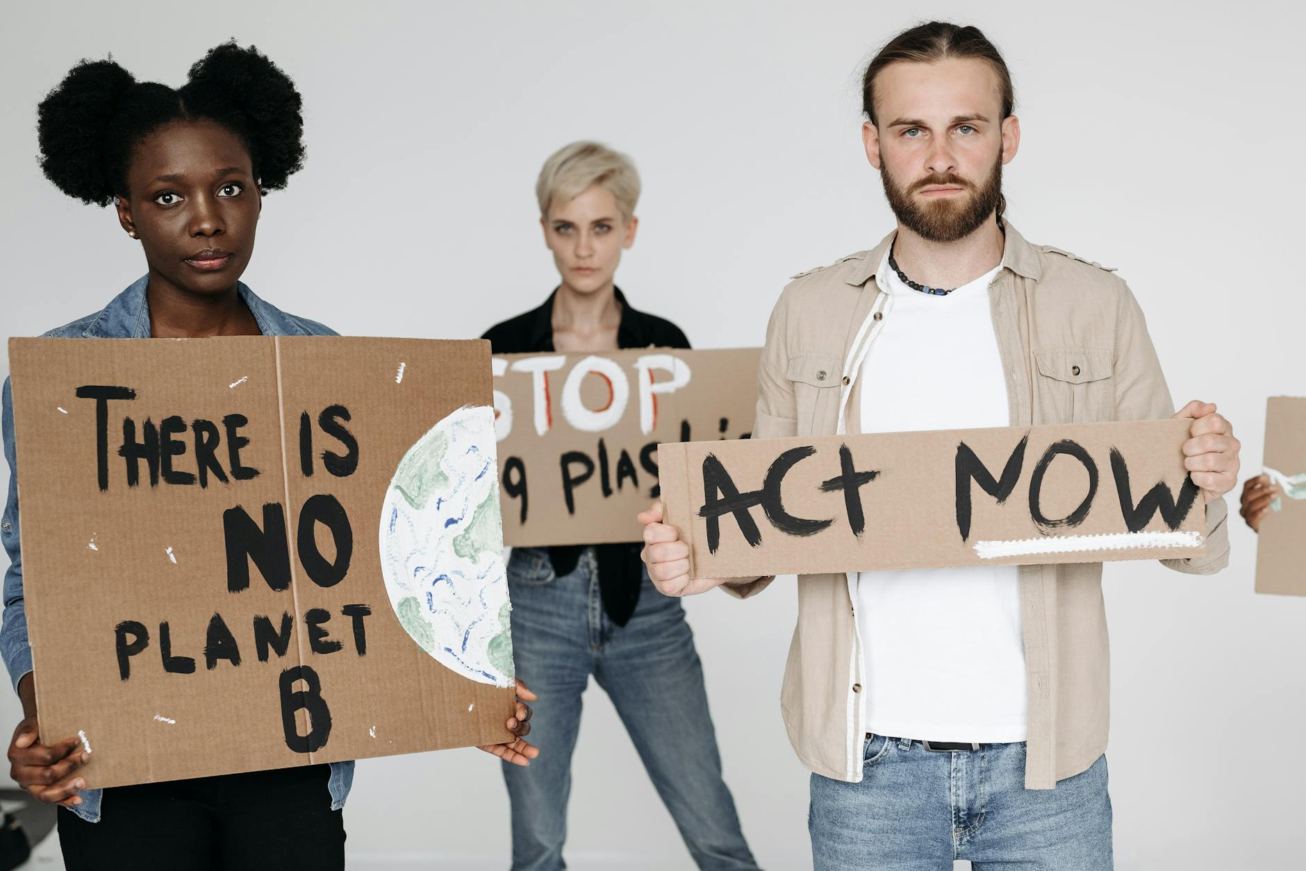 A group of diverse individuals engaged in a heated debate about climate change, captioned 'Engaging in the Climate Change Debate'
