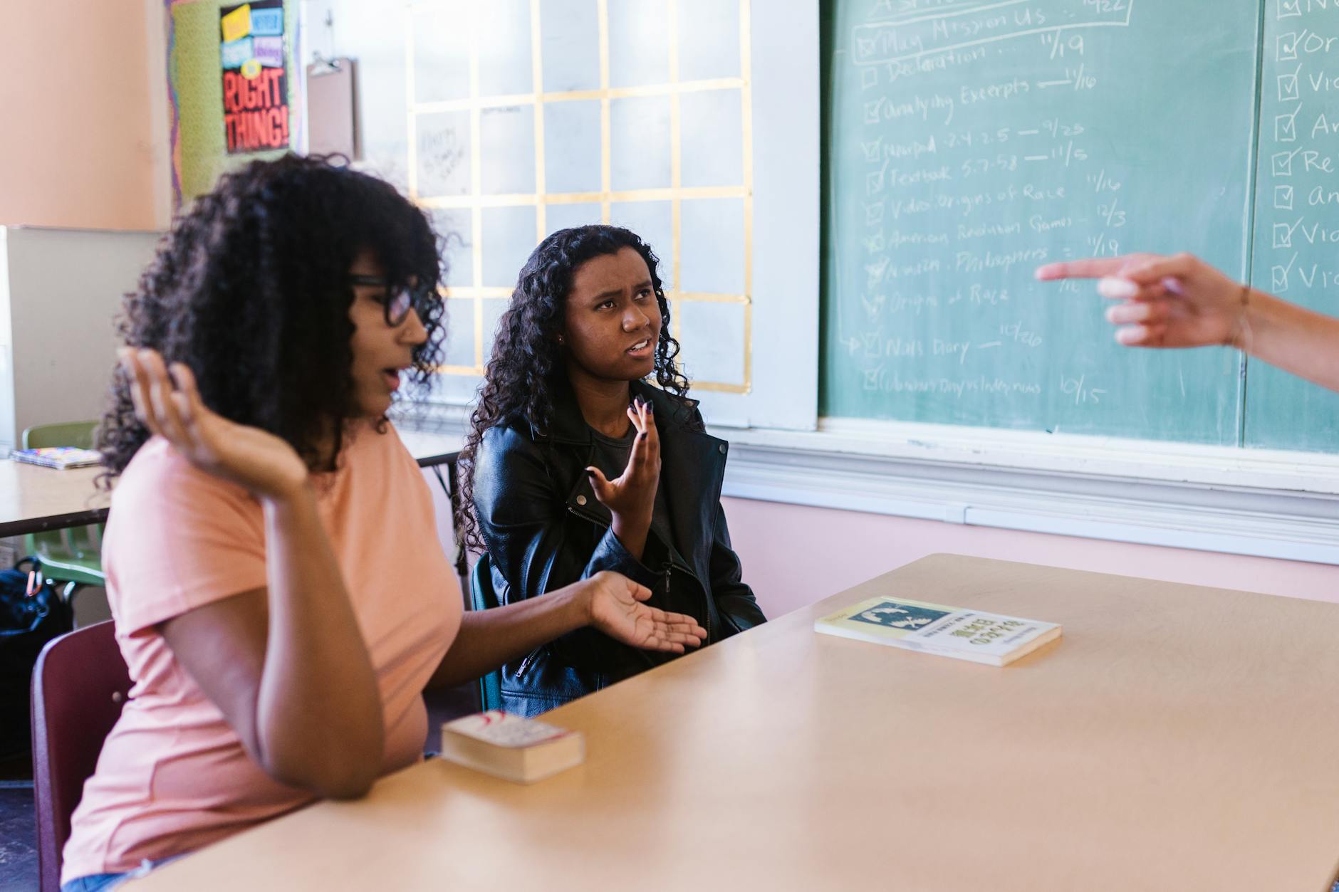 A photo of a debate team practicing their strategies in a classroom setting — debate strategies