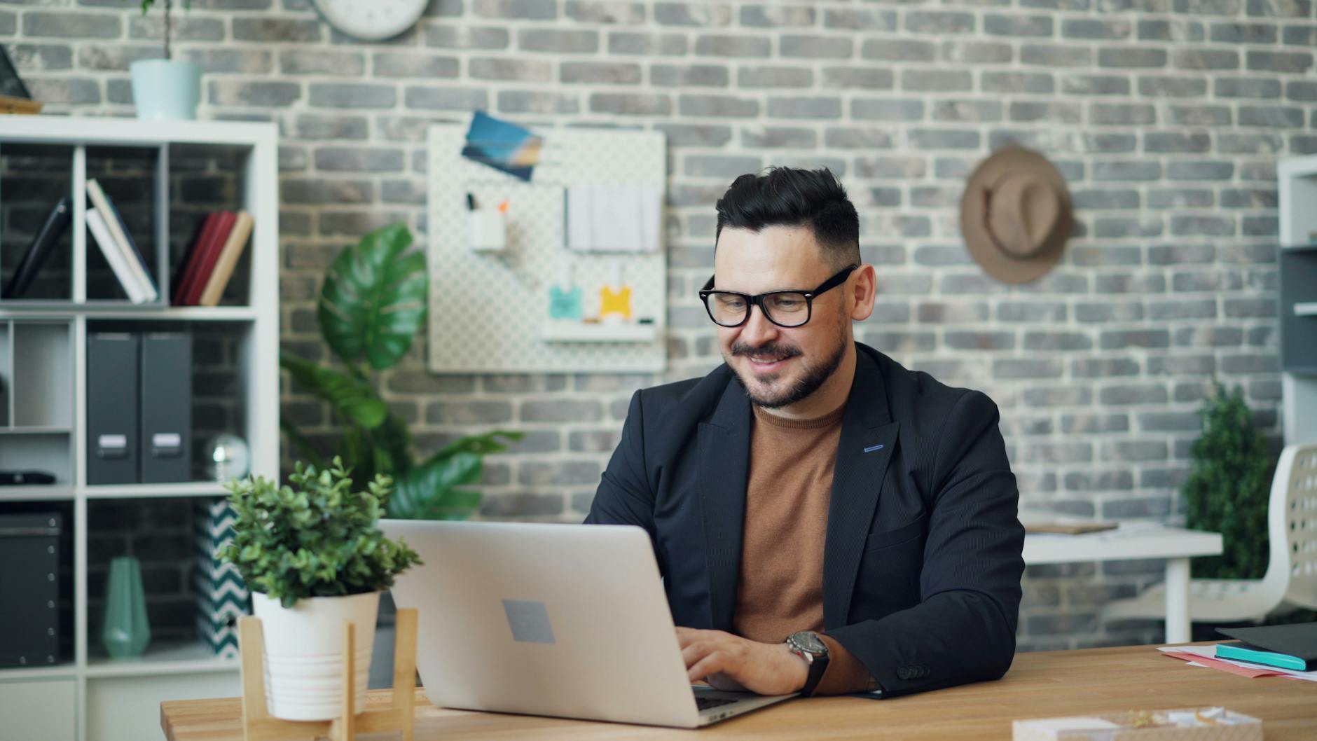 A split image showing a remote worker at home and a bustling traditional office environment. — future of work