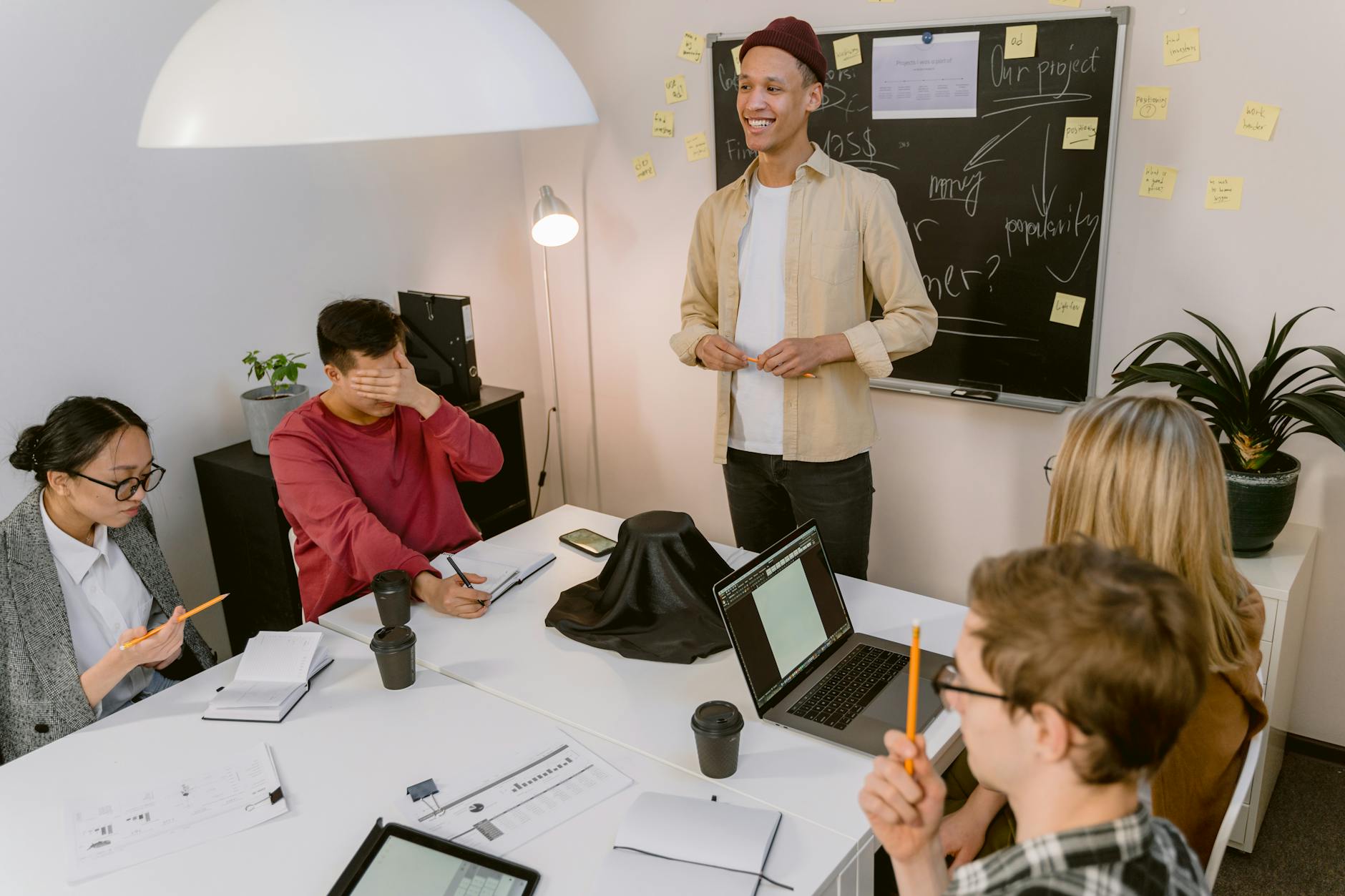 An image of a debate club meeting in progress, highlighting diverse participants sharing ideas. — debate club benefits