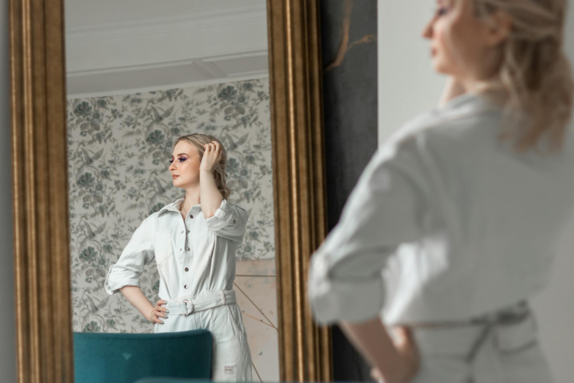 An image showing a person practicing public speaking in front of a mirror. — debate preparation tips