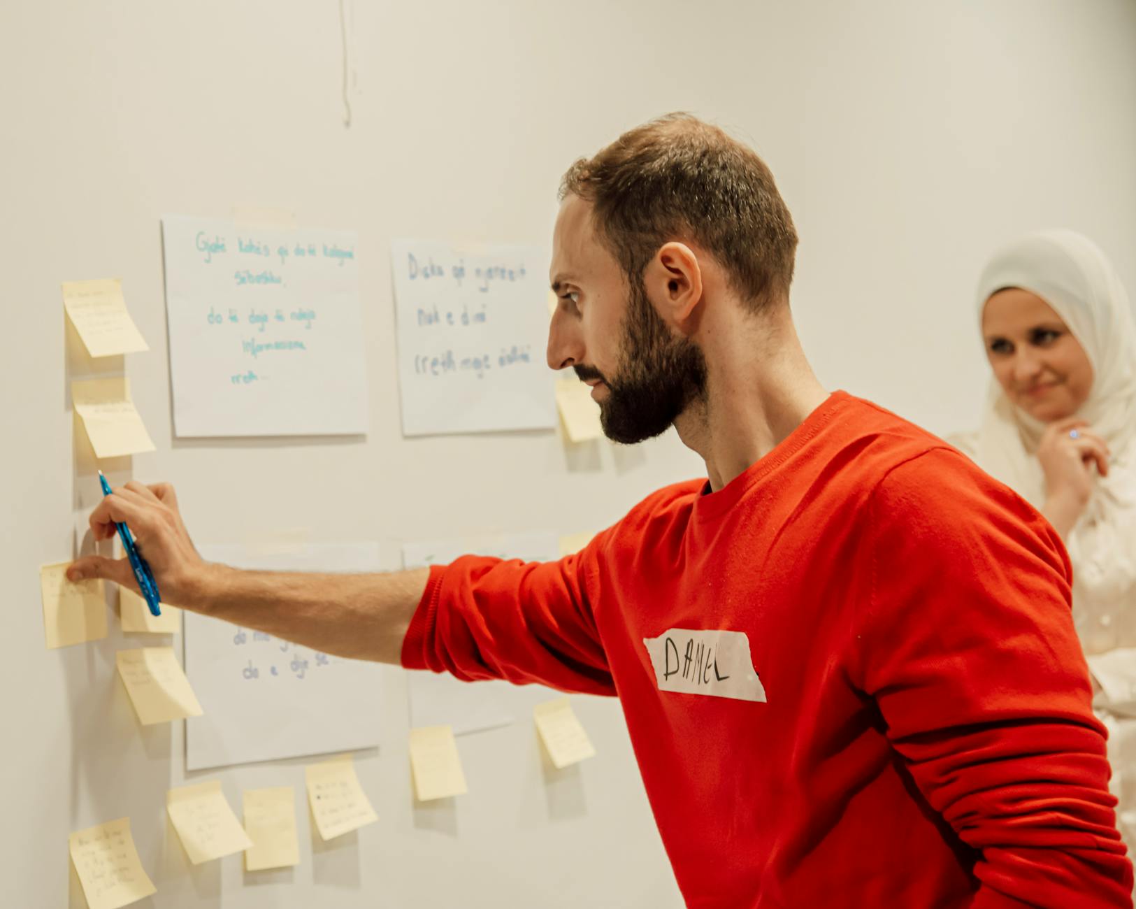 Members participating in a team-building exercise, showcasing collaboration and communication. — debate club activities
