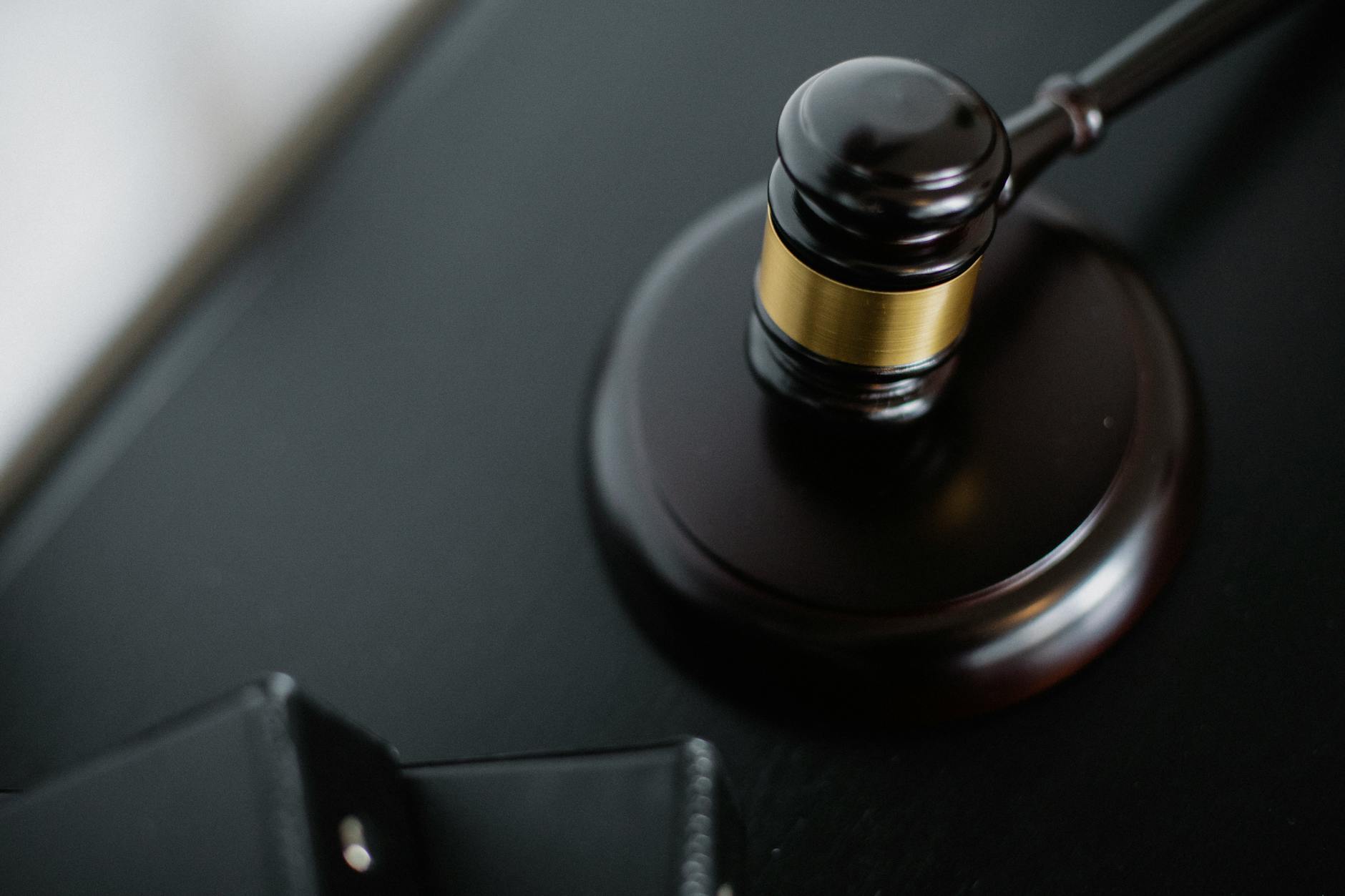 A close-up of a gavel, symbolizing the importance of ethics and truth in discussions. — ethics in debate