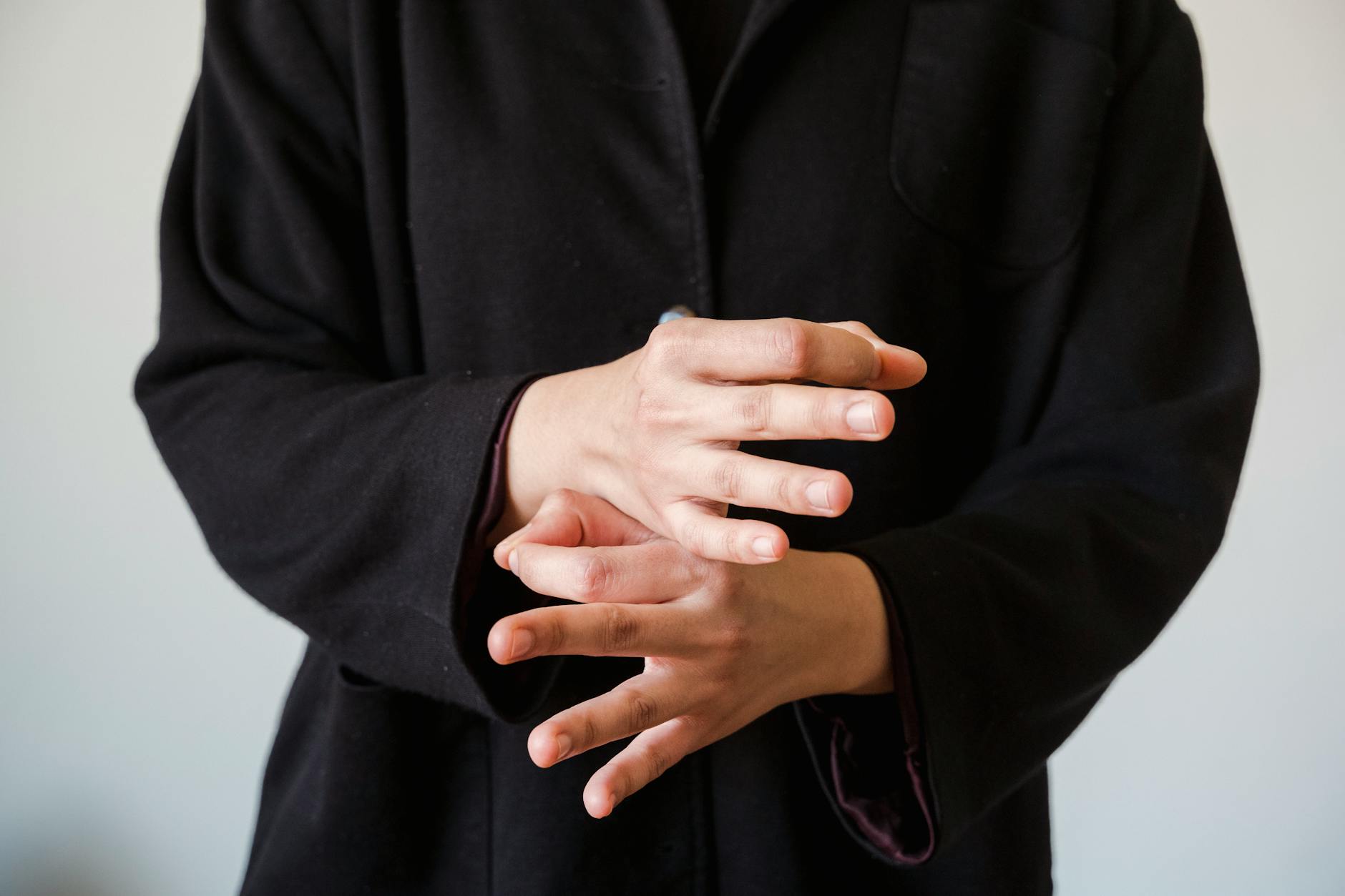A close-up of a speaker using body language effectively during a debate. — debate techniques