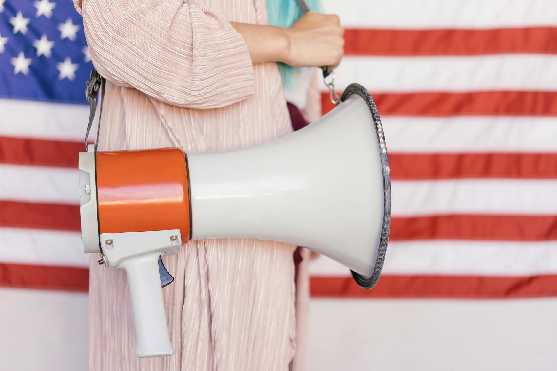 A conceptual image of a person speaking into a megaphone, symbolizing freedom of speech. — cancel culture