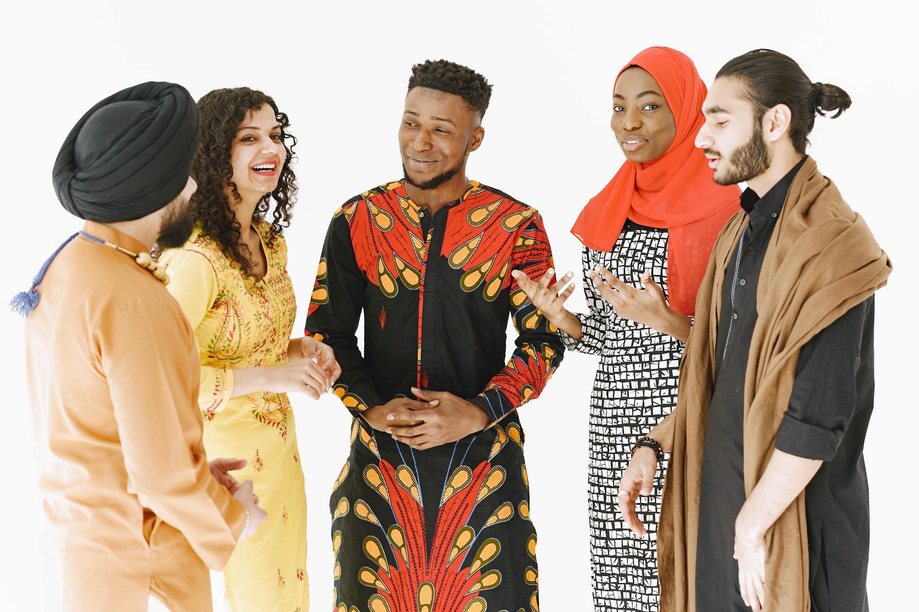 A diverse group of people engaged in a discussion about cultural issues, showcasing different perspectives in cultural debates.