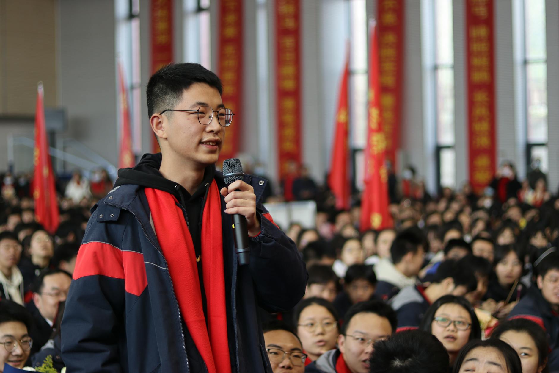 A diverse group of students participating in a debate competition. — future of debating