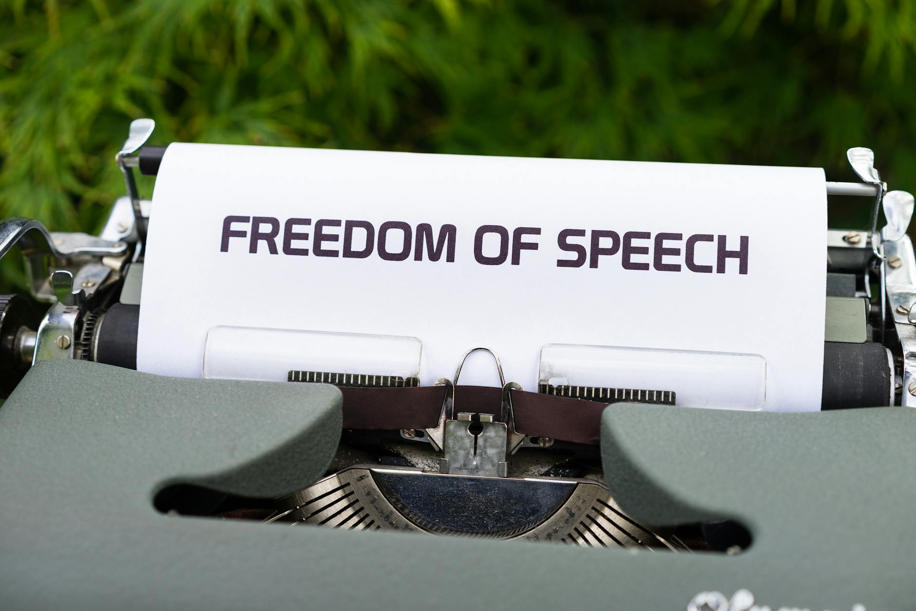 A graphic showing the balance between freedom of speech and hate speech in digital spaces. — digital censorship