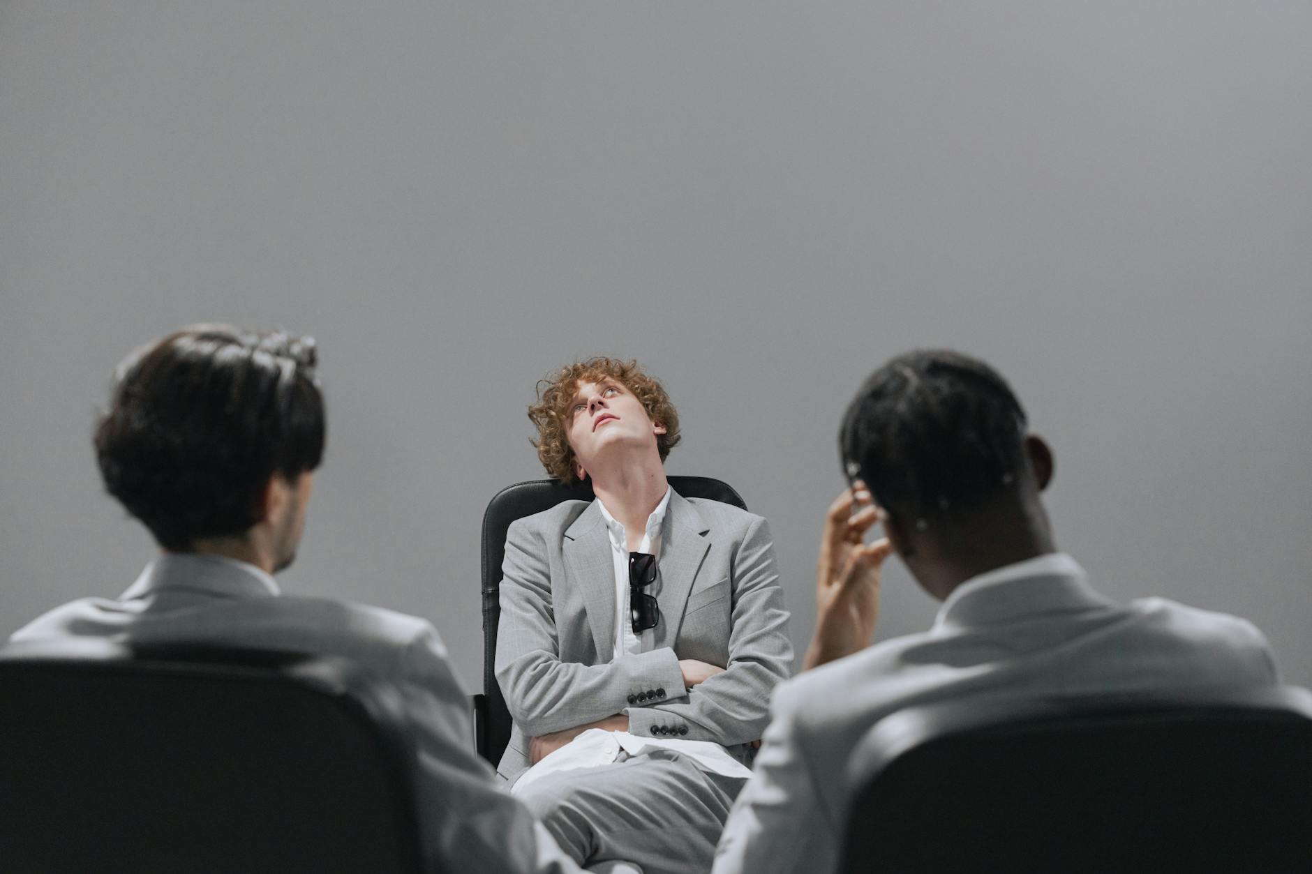 A group of people engaged in a heated debate, showcasing diverse opinions on honesty. — ethics in debate