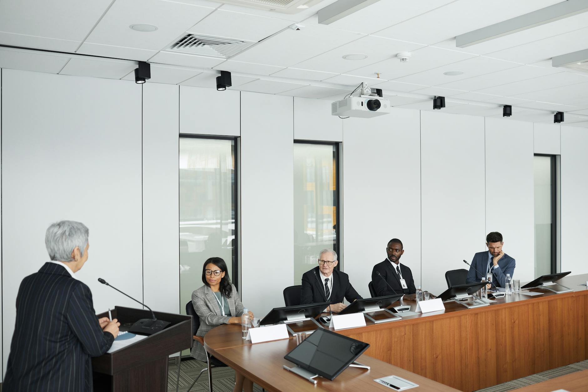 A photo of a debate setting, highlighting participants actively engaging in discussion with effective persuasion techniques.