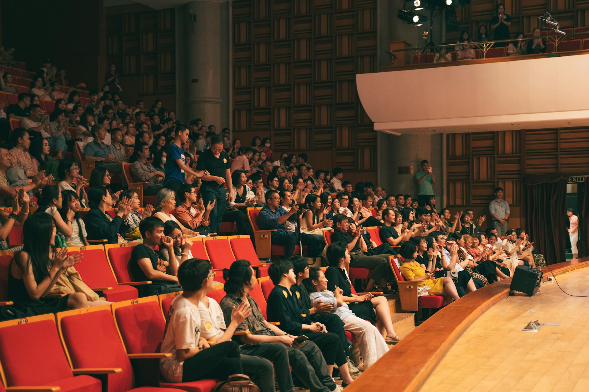 A photo of a live debate event showcasing audience engagement. — debate formats