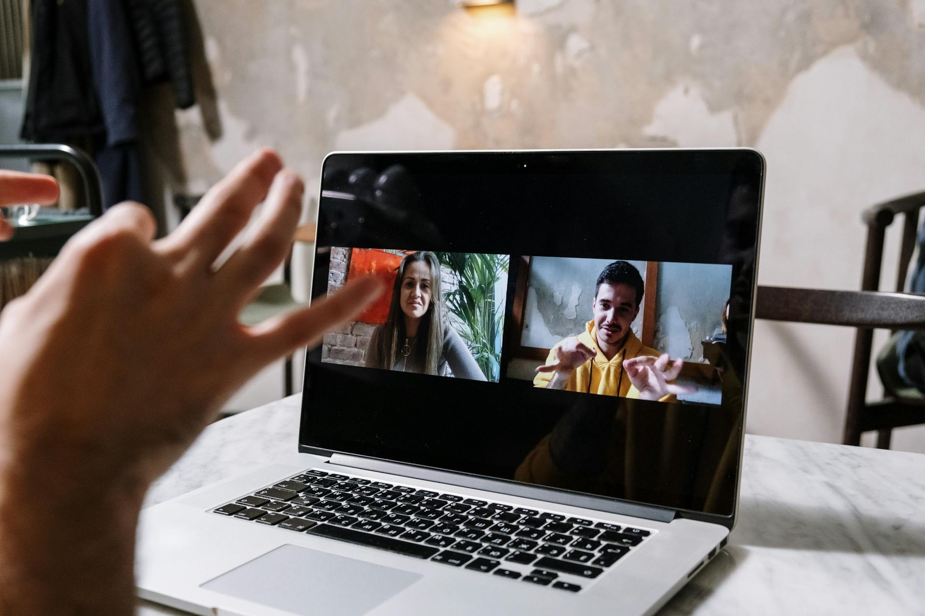 A screenshot of a virtual debating platform interface, showcasing features like video conferencing and chat options.