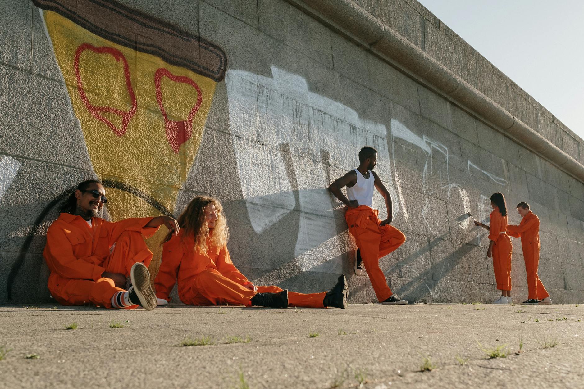 A vibrant mural depicting social justice themes in an urban setting, showcasing community involvement. — art and activism