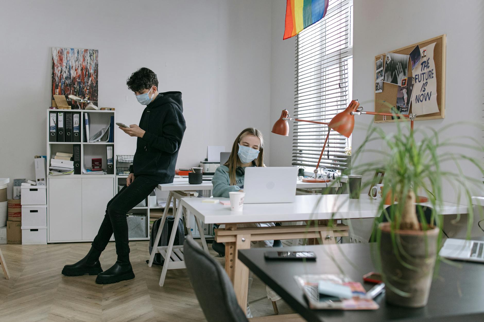 A visual representation of a hybrid work model showing both remote and in-office elements. — remote work debate