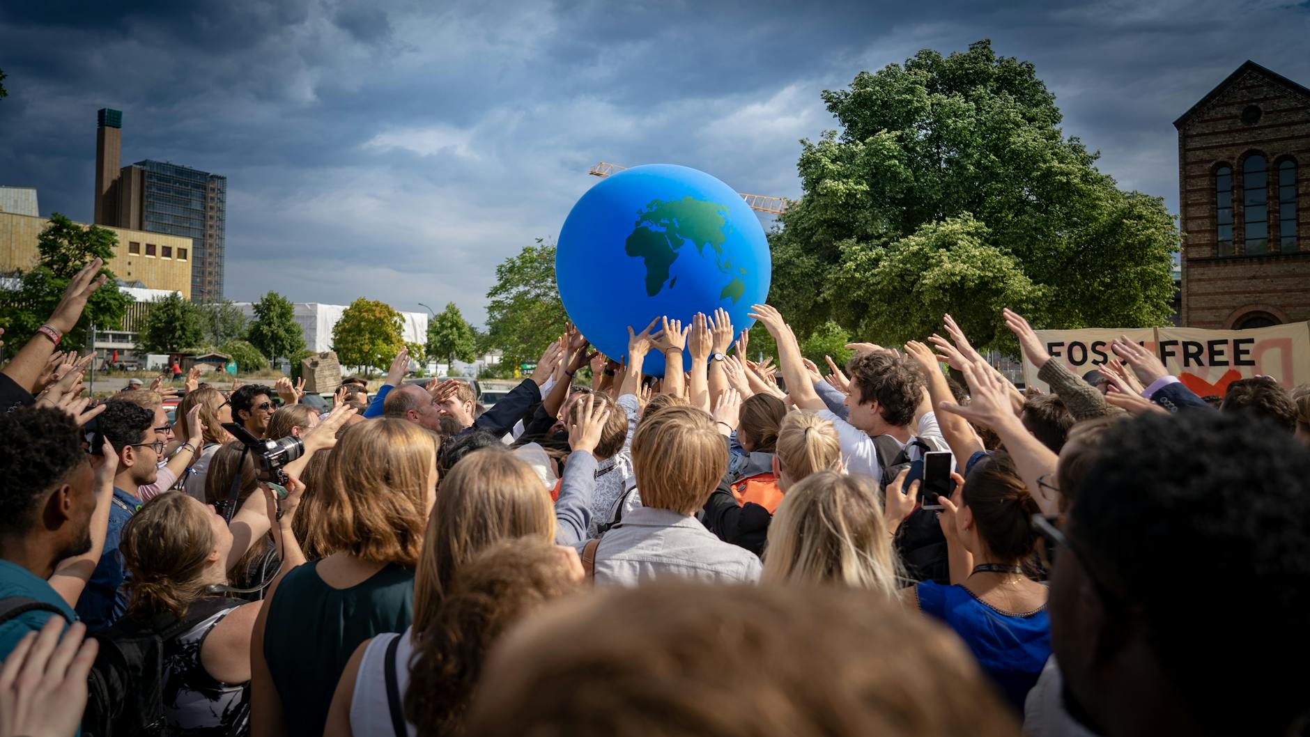 A visual representation of the impact of climate change policies on global communities. — controversial debate topics