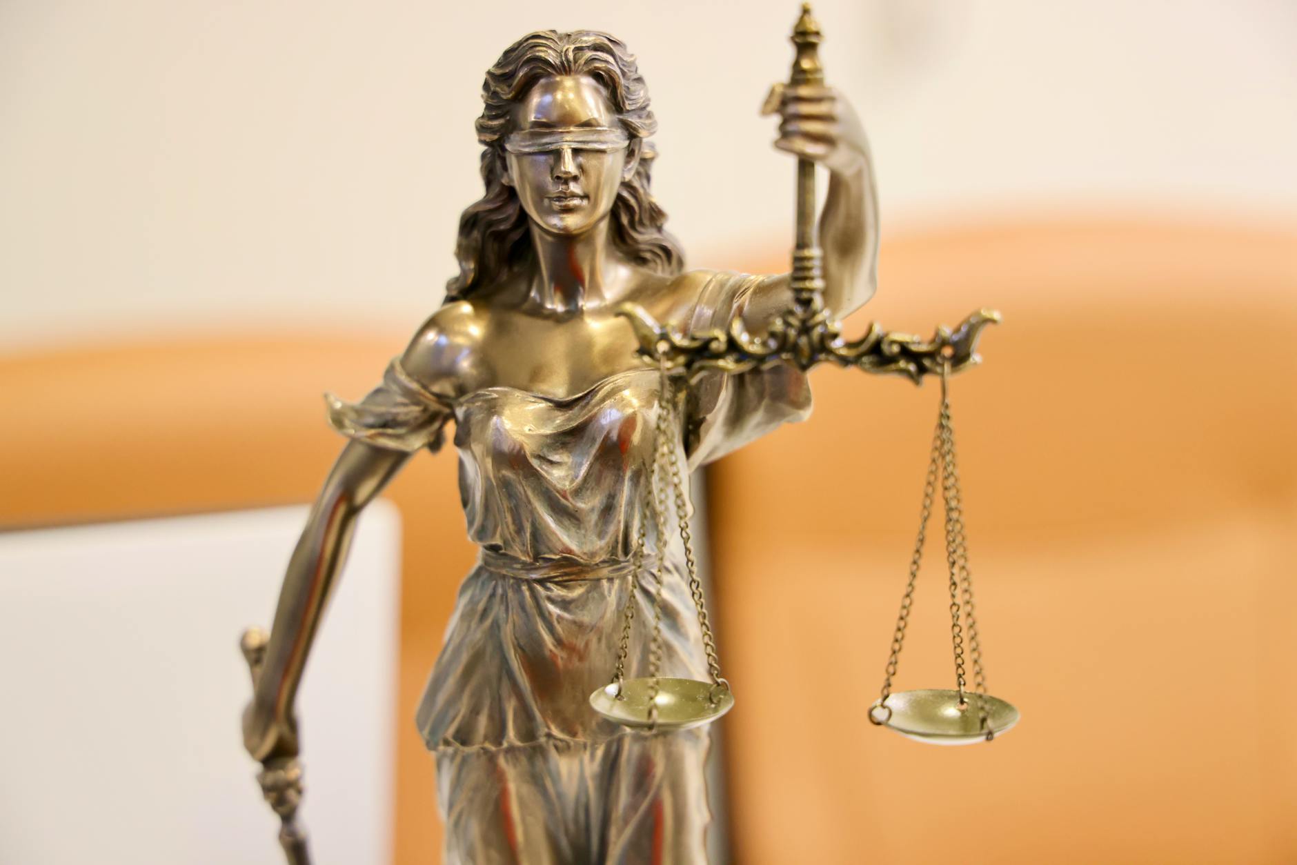 A visual representation of the scales of justice balancing censorship and free speech. — free speech debate
