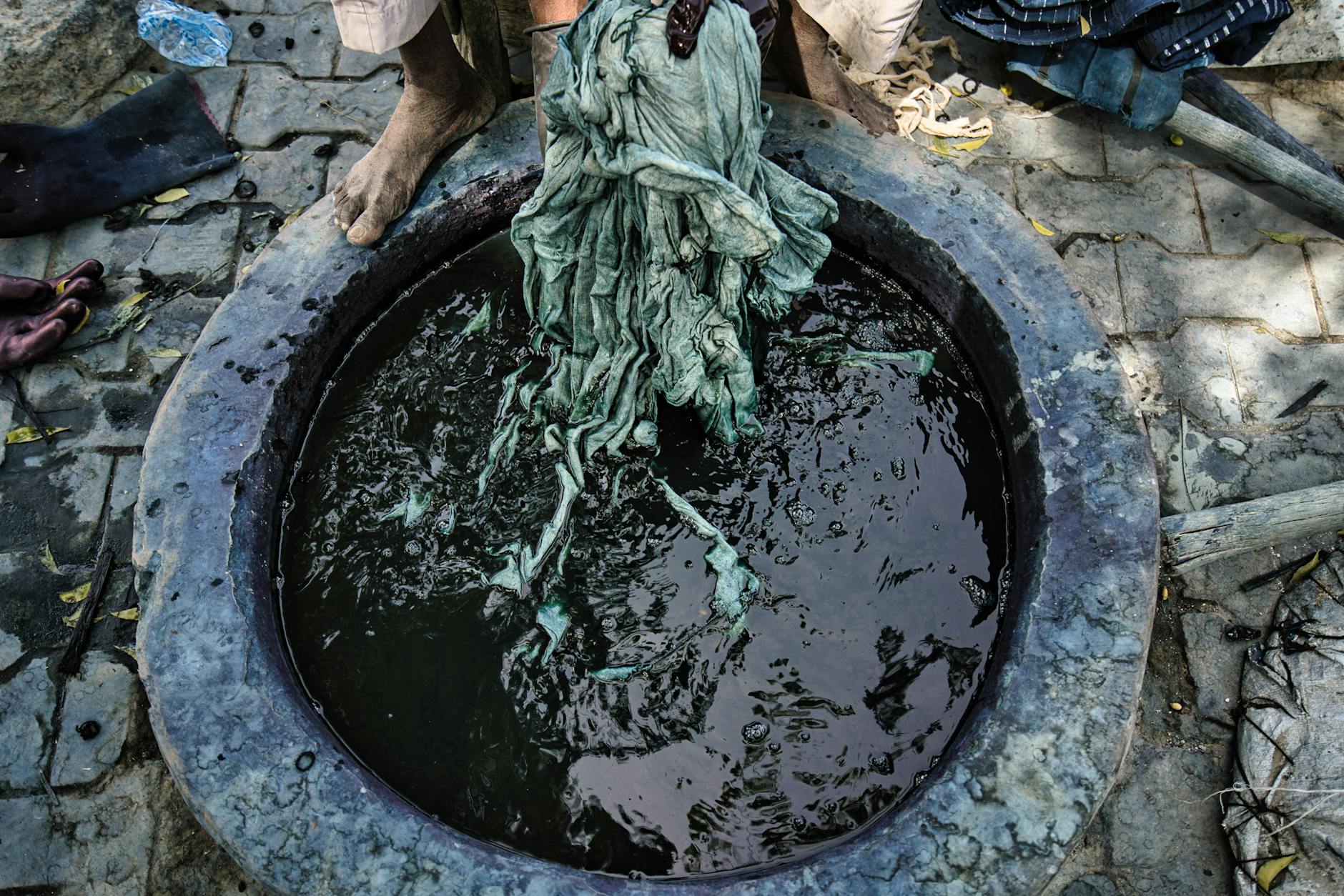 Before-and-after images of polluted water sources affected by textile dyeing processes. — fast fashion impact