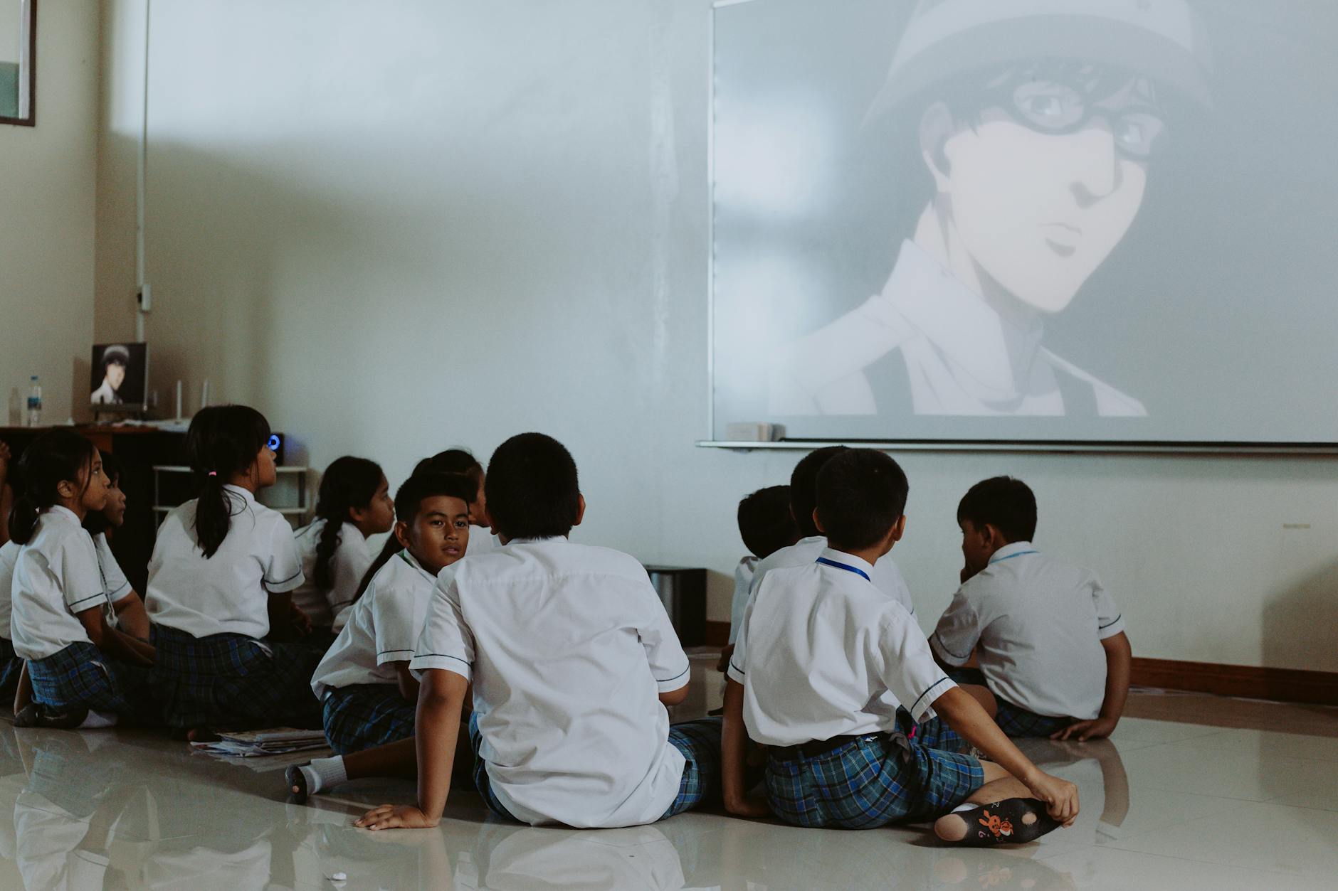 A classroom equipped with modern education technology tools like interactive whiteboards and tablets.