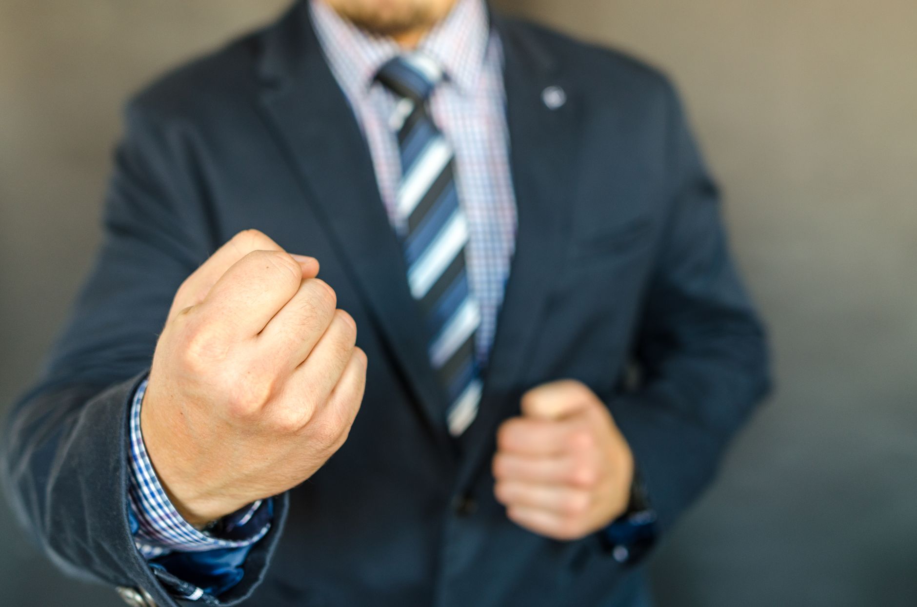 A close-up of a person delivering a powerful closing statement during a debate, emphasizing the importance of a strong con…