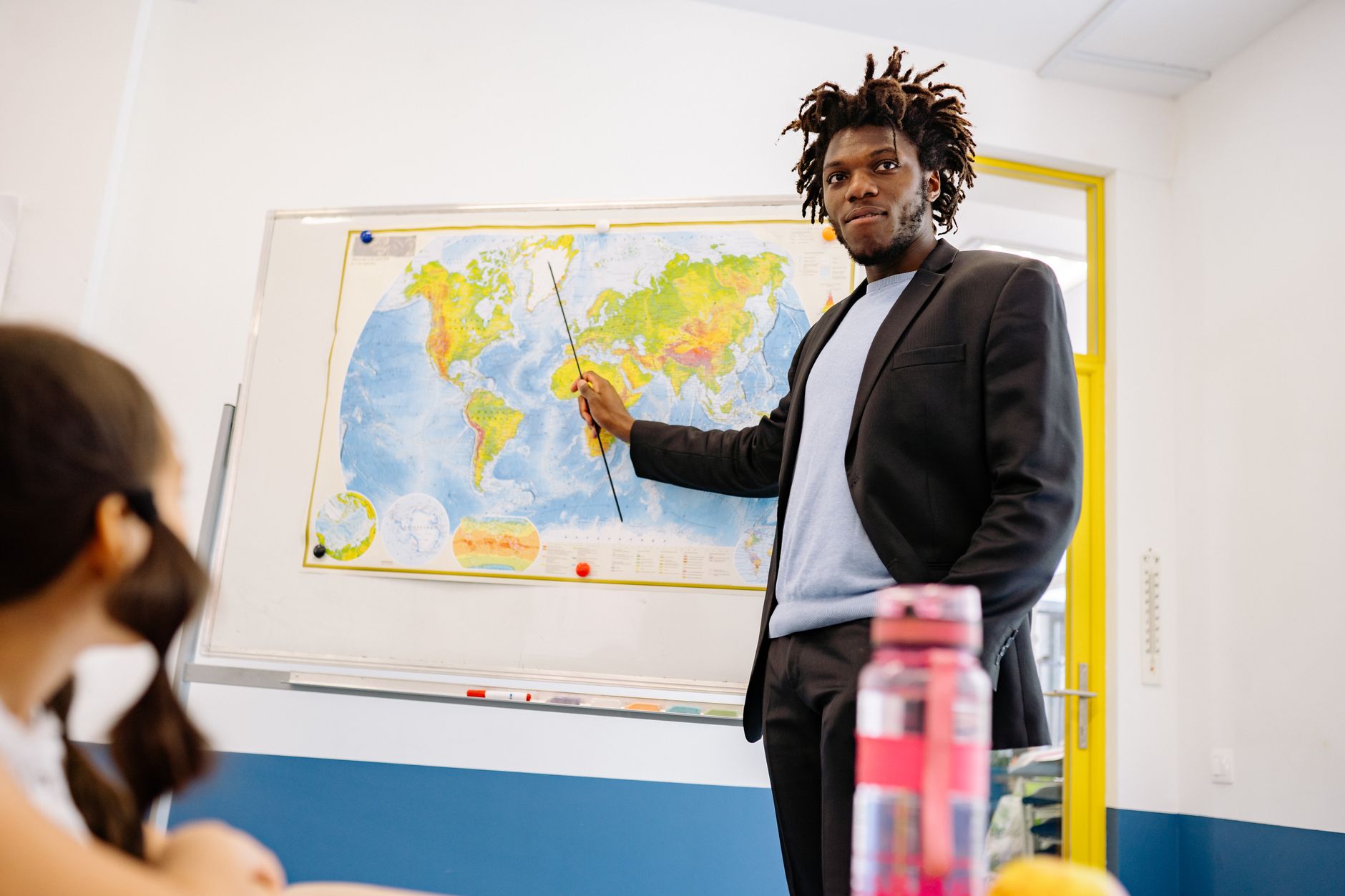 A close-up of a student presenting their arguments with confidence, using visual aids to enhance their points. — debate …