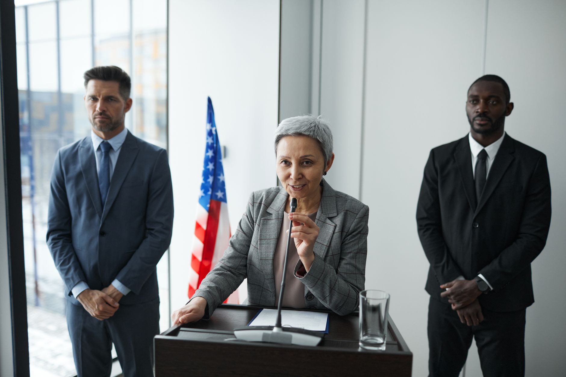 A collage of famous debaters like Barack Obama and Margaret Thatcher during their pivotal speeches. — persuasion techniques
