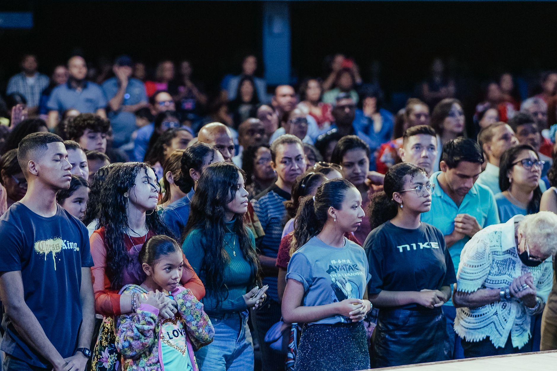 A diverse group of people engaged in a lively debate, showcasing varied opinions. — controversial debate topics