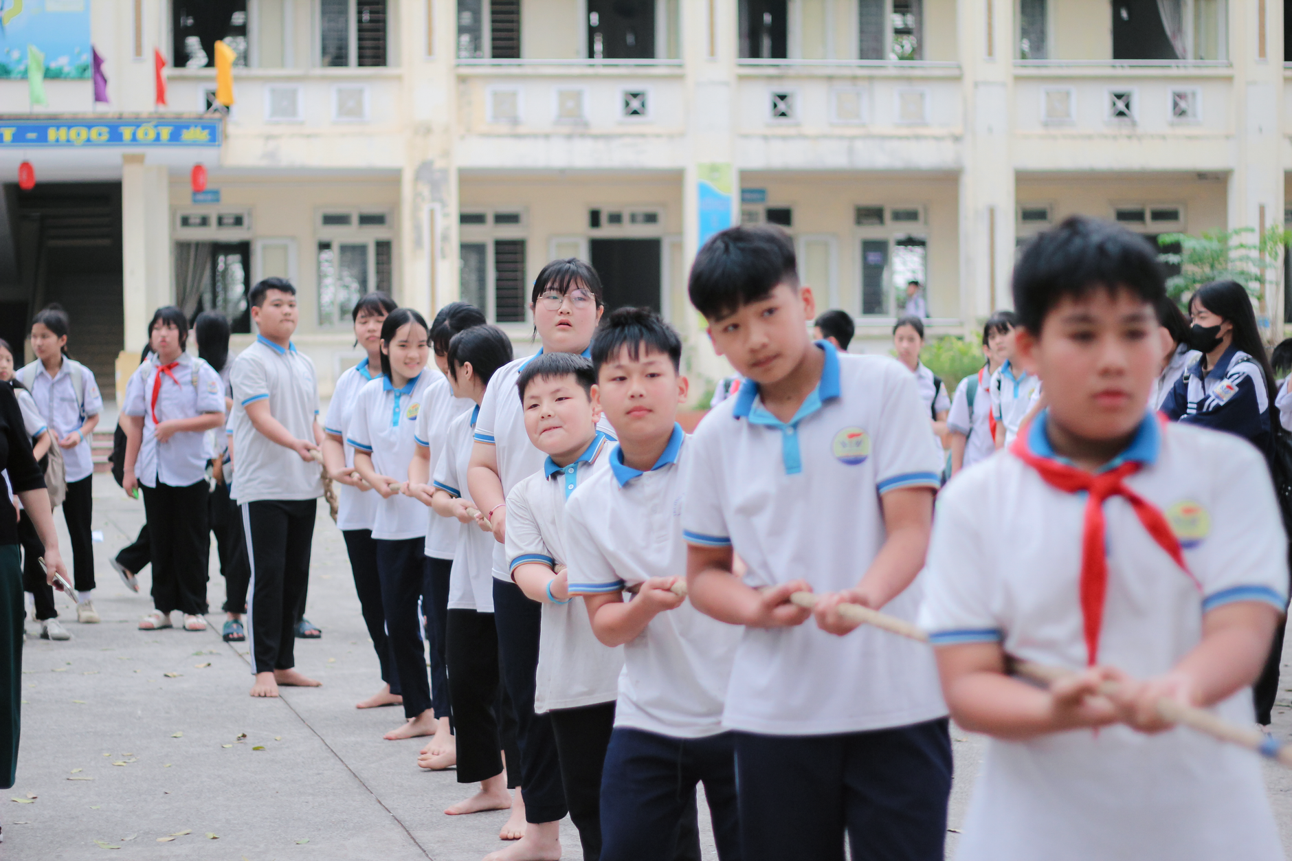 A group of children participating in a debate competition, showcasing their engagement and enthusiasm. — debating for kids
