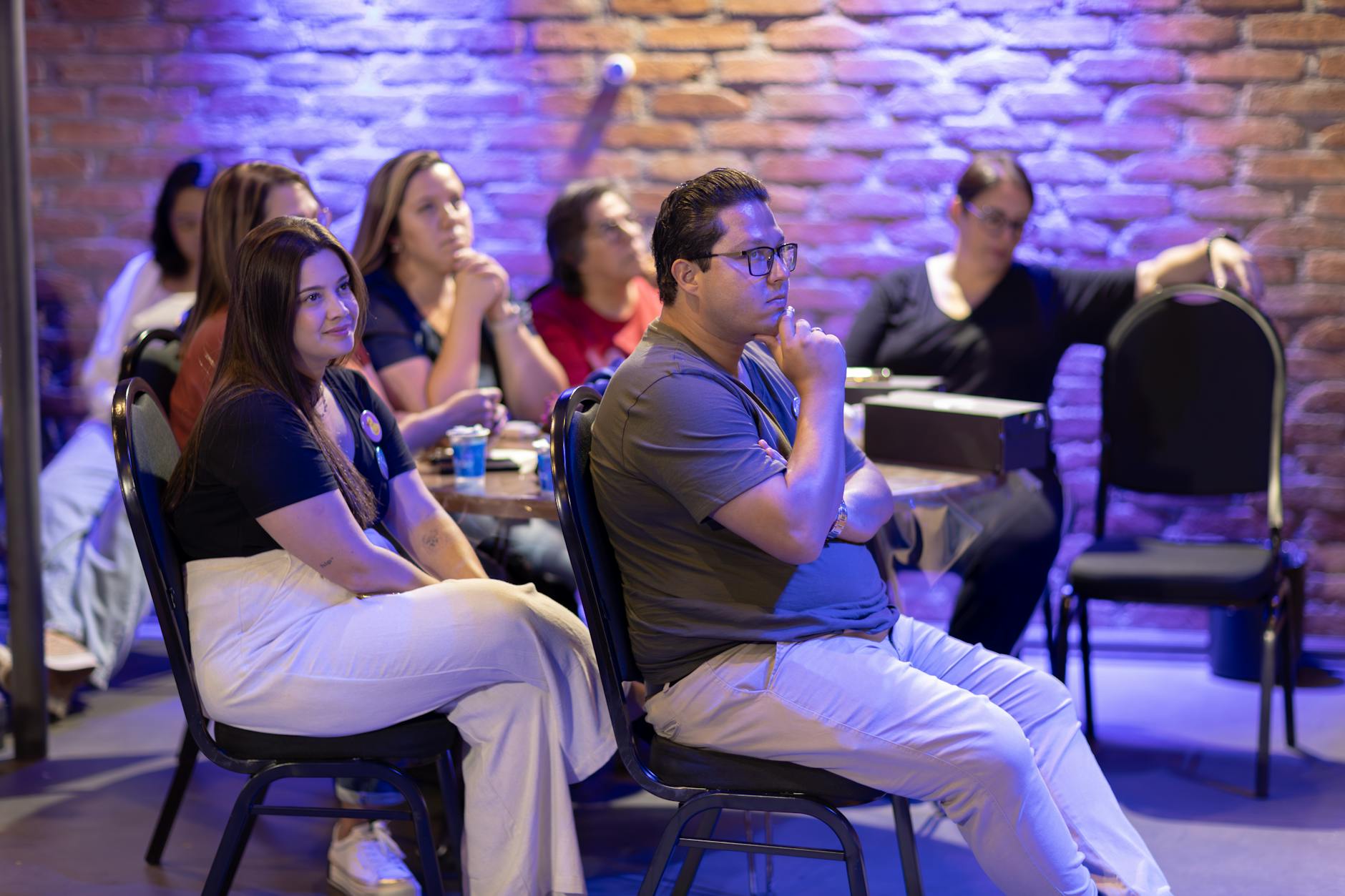 A group of introverts engaging in a small discussion, showcasing active listening and thoughtful exchanges. — debate for…