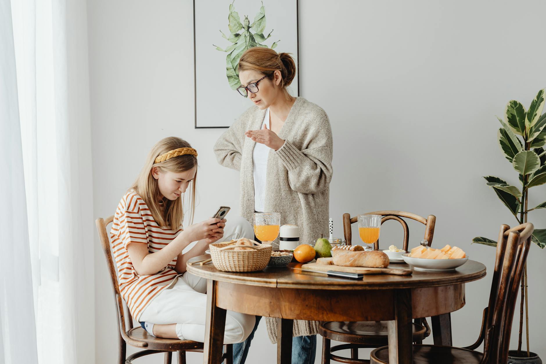 A parent and child discussing gaming habits in a constructive manner. — video games debate