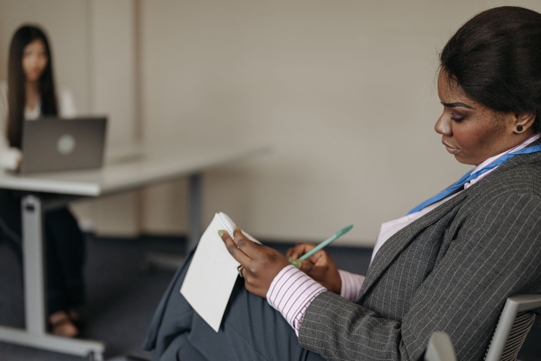 A participant preparing notes and strategies before a debate. — handle adversity in debates
