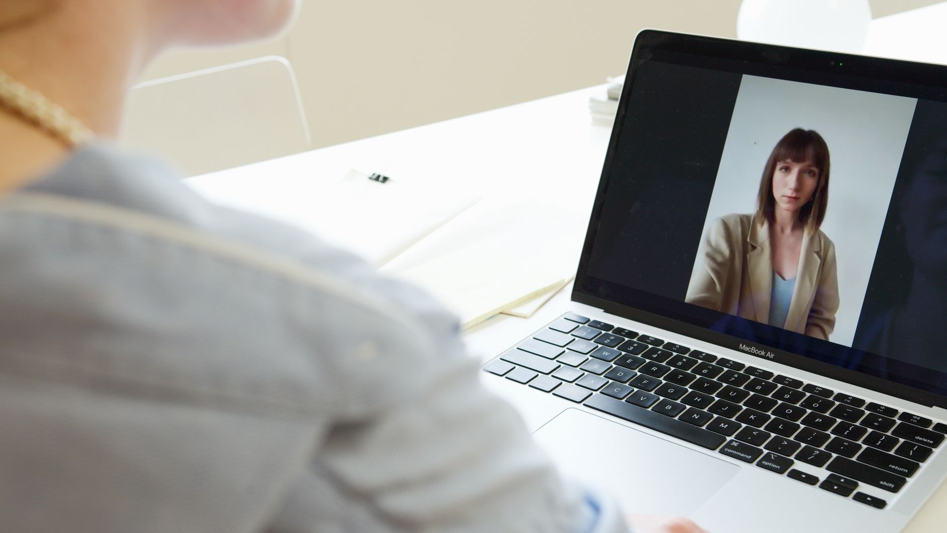 A photo of a virtual debate in progress, highlighting participants interacting through video conferencing. — online deba…