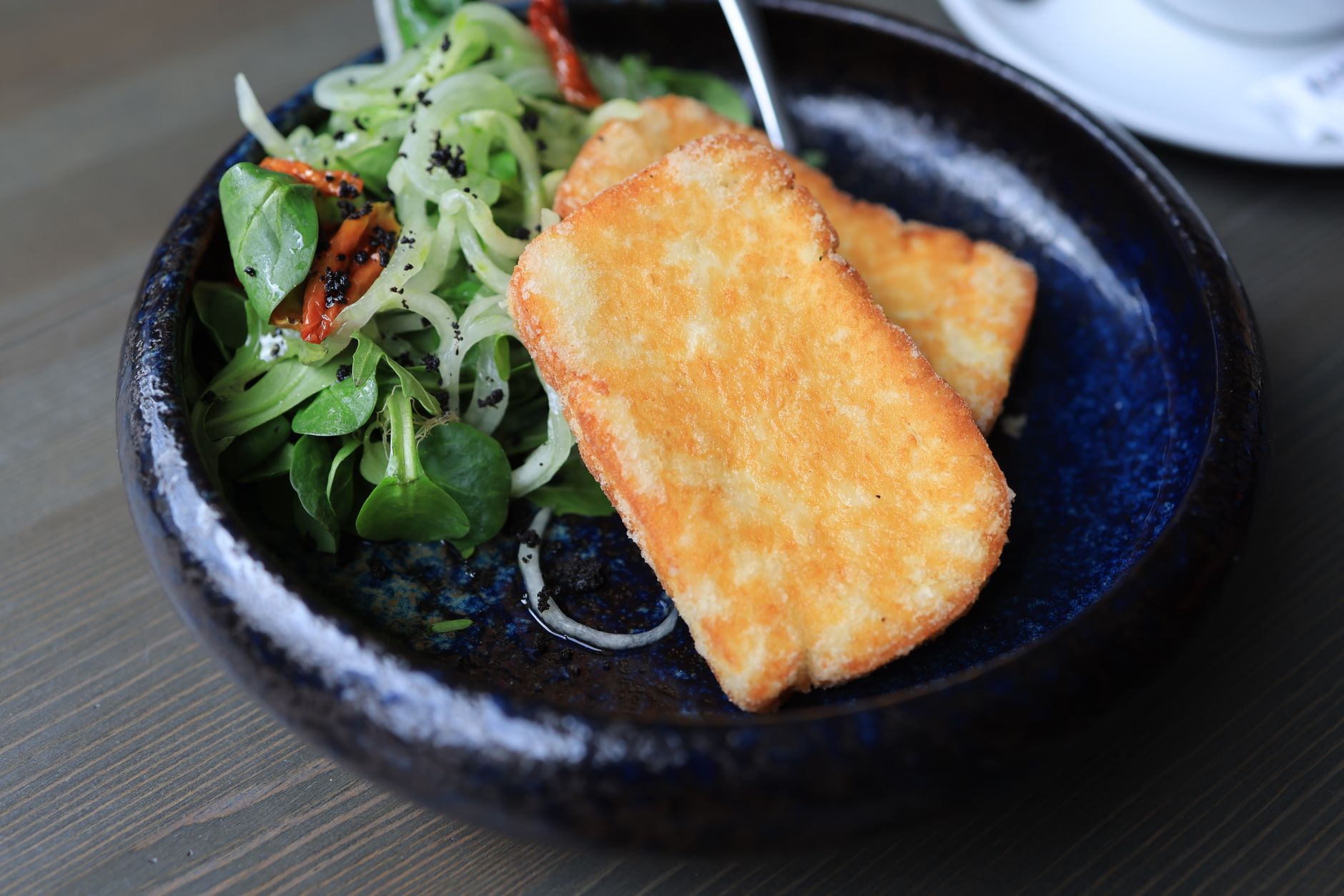 A plate of colorful plant-based meals highlighting meat alternatives. — meat consumption