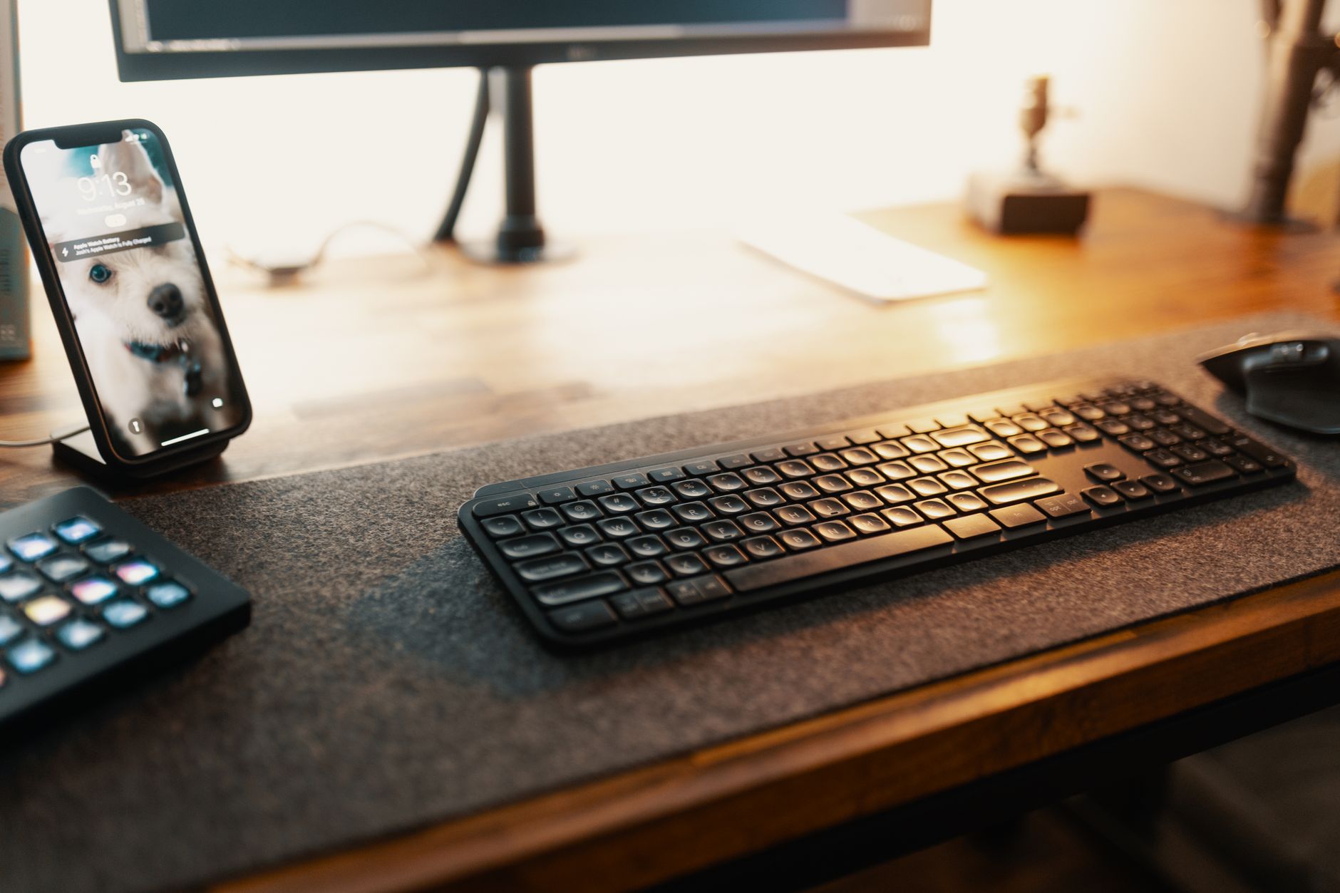 A split image comparing a remote work setup at home with a traditional office environment.