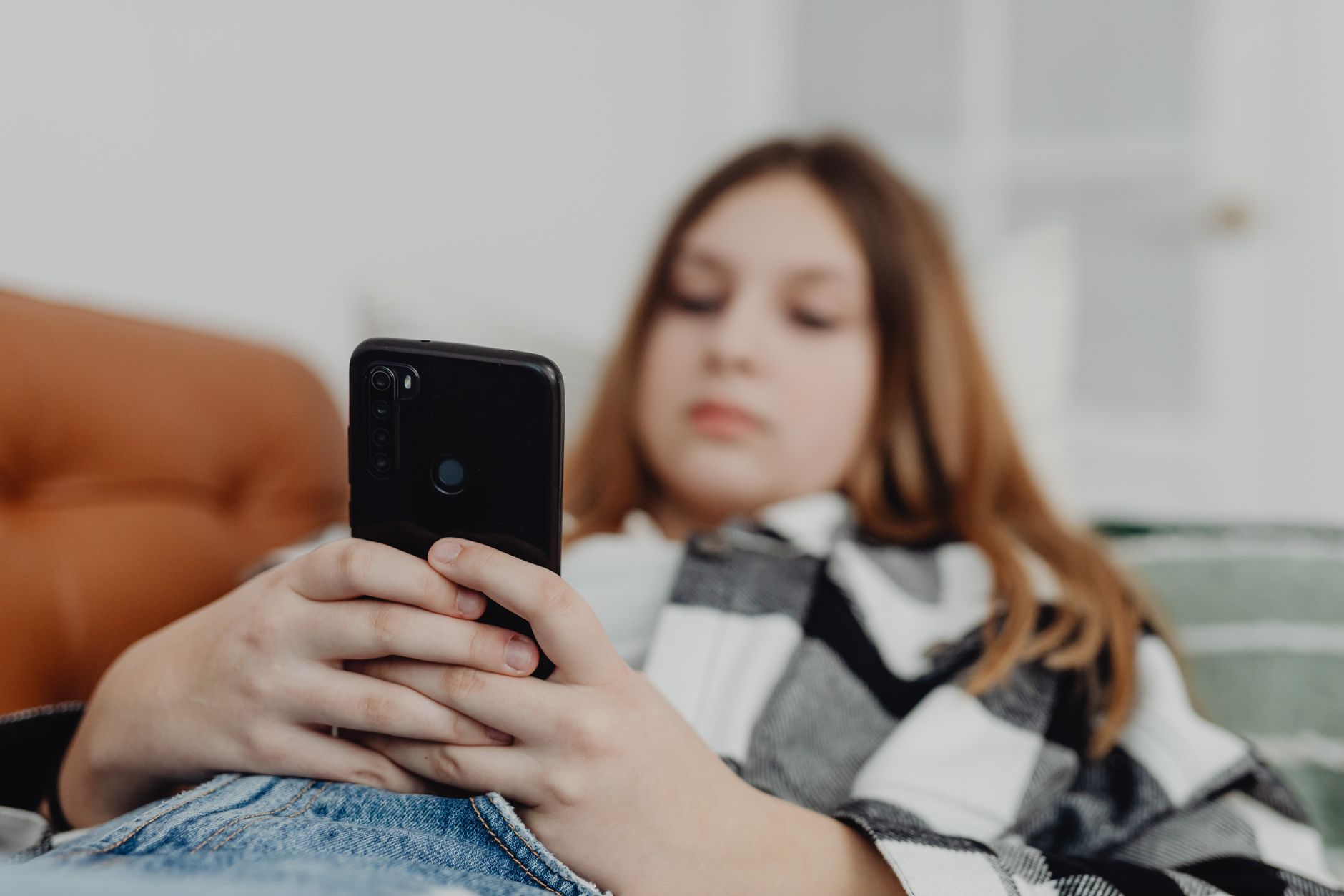 An infographic illustrating the risks teens face on social media without age restrictions. — social media age limit