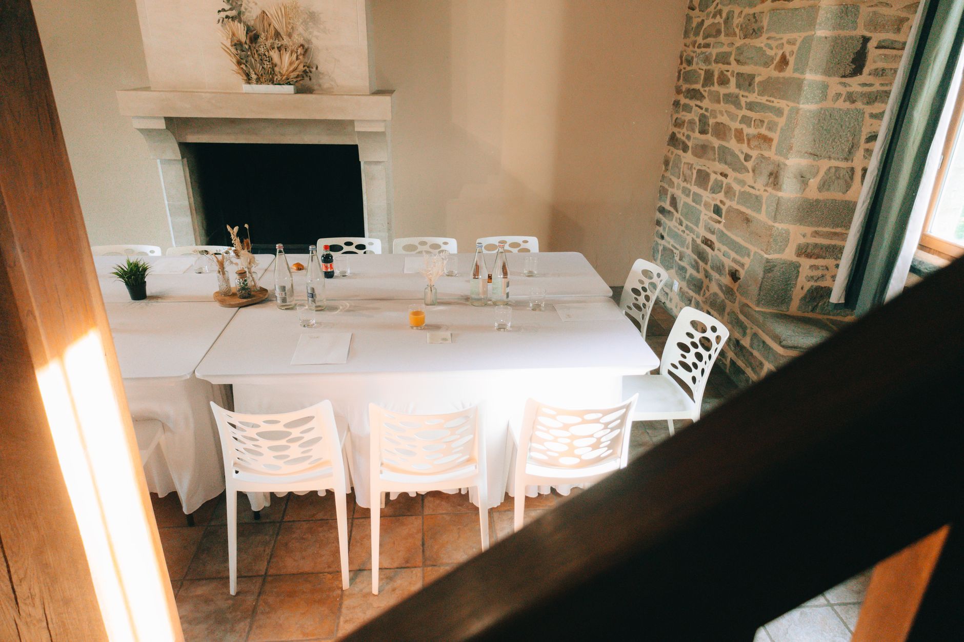 An inviting setup for a home debate night with chairs arranged in a circle and a timer on the table. — hosting debates