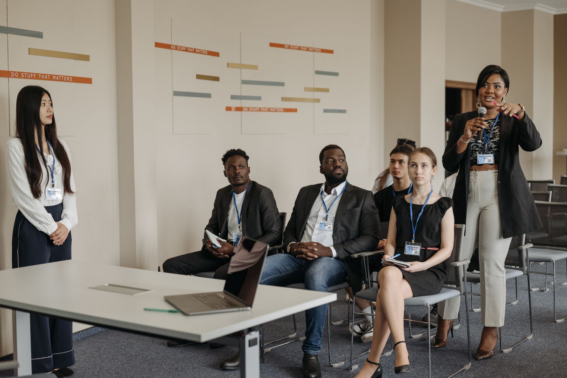 Photo of a training session focused on developing debate skills among professionals. — debate skills workplace