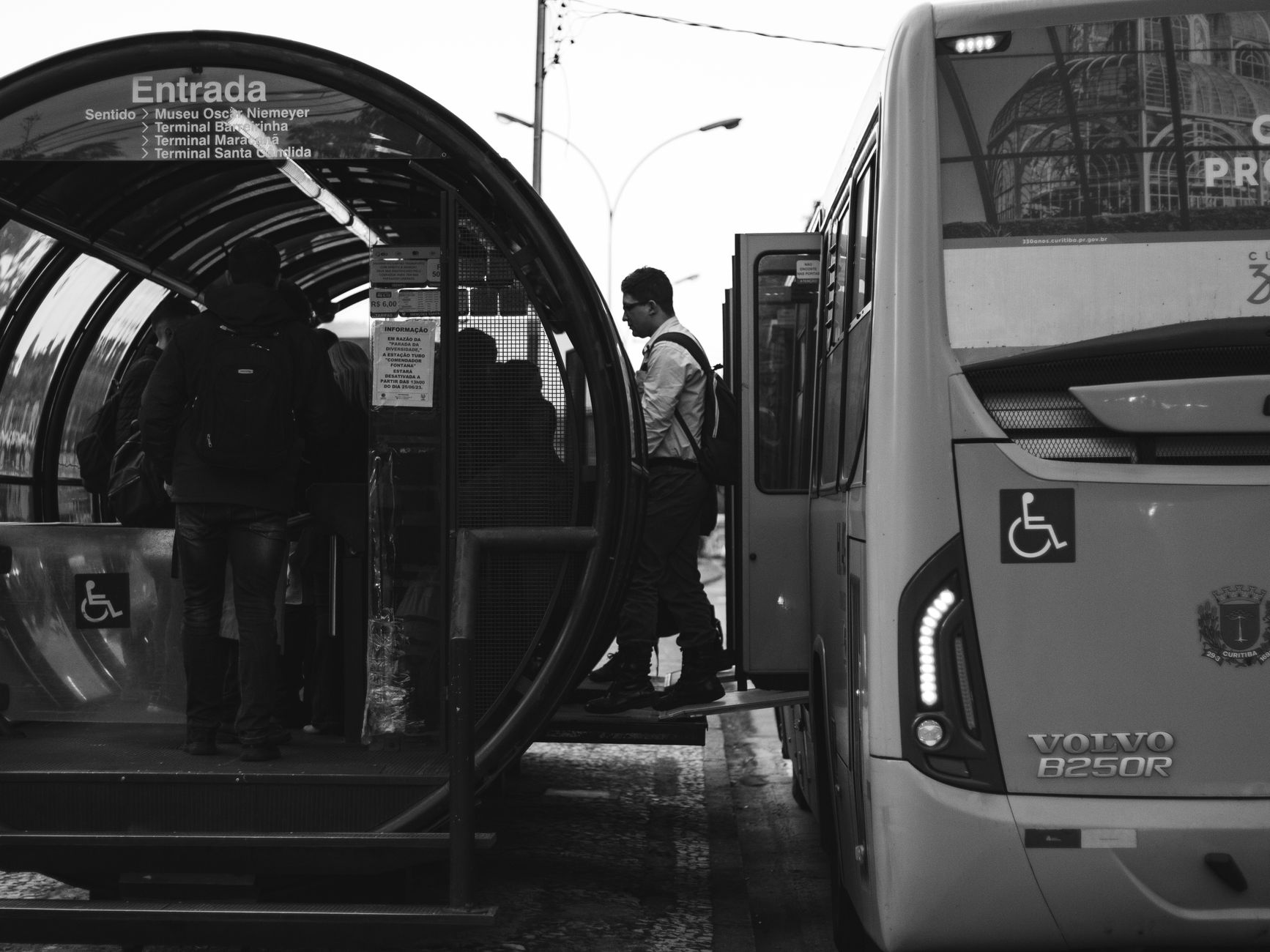 A bustling city bus with diverse passengers, illustrating the accessibility of public transport. — transport debate