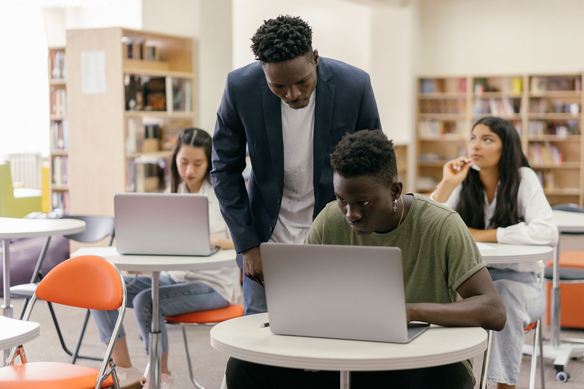 A classroom scene showing diverse students engaged in learning — free college education