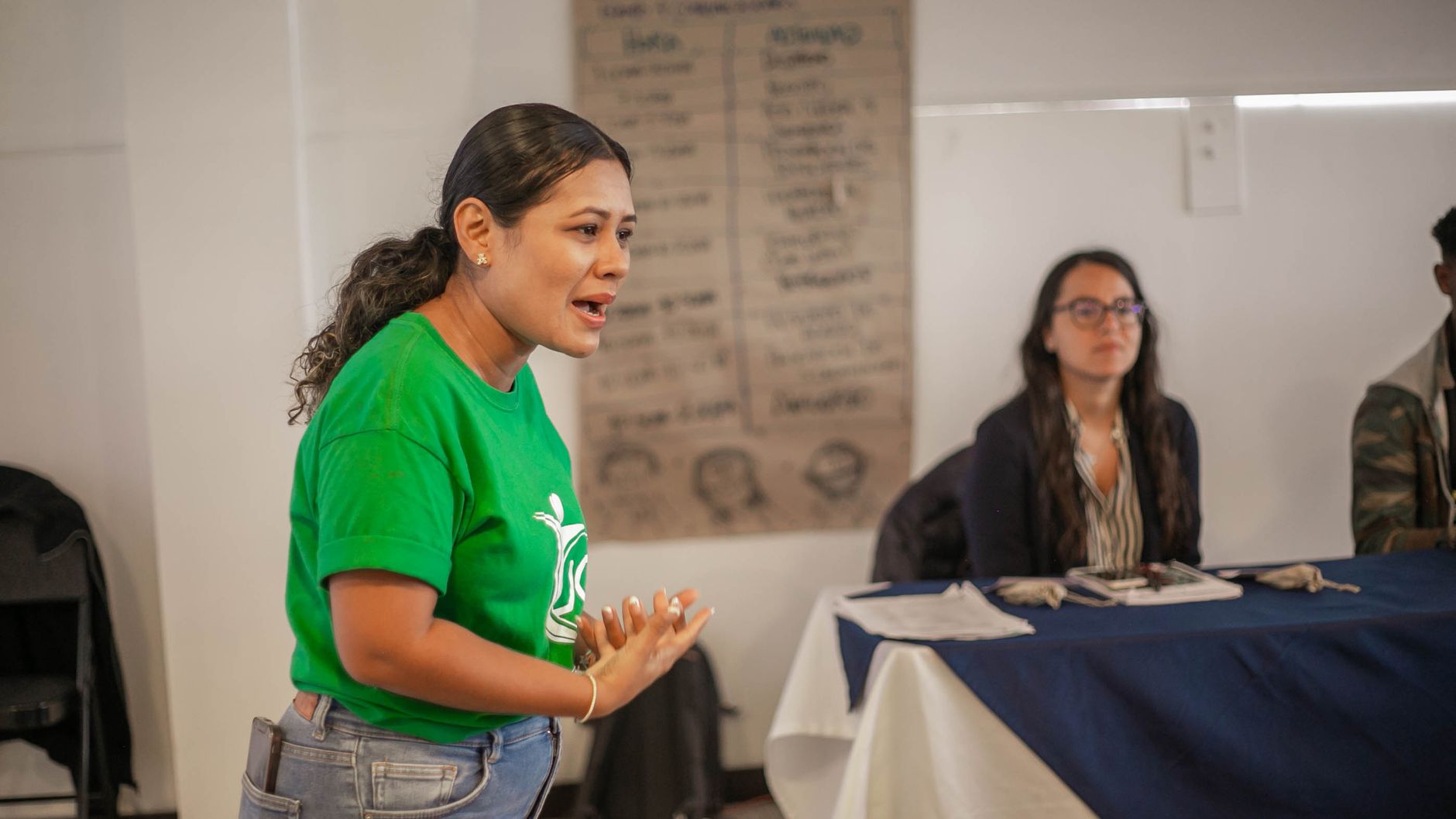 A close-up of a participant practicing their speech in front of a mirror, emphasizing mental preparation techniques. — d…