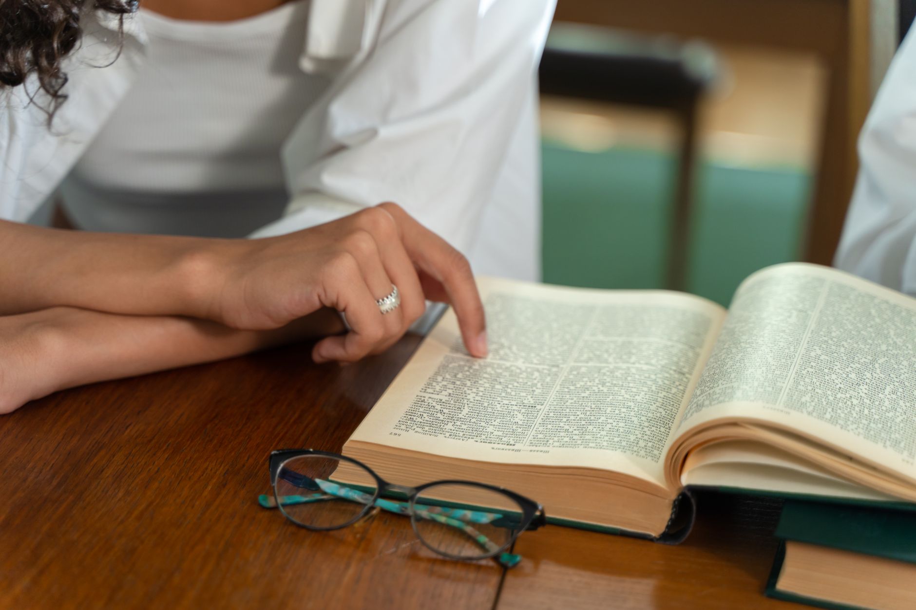 A close-up of students researching and preparing their arguments for an upcoming debate. — debate topics for students