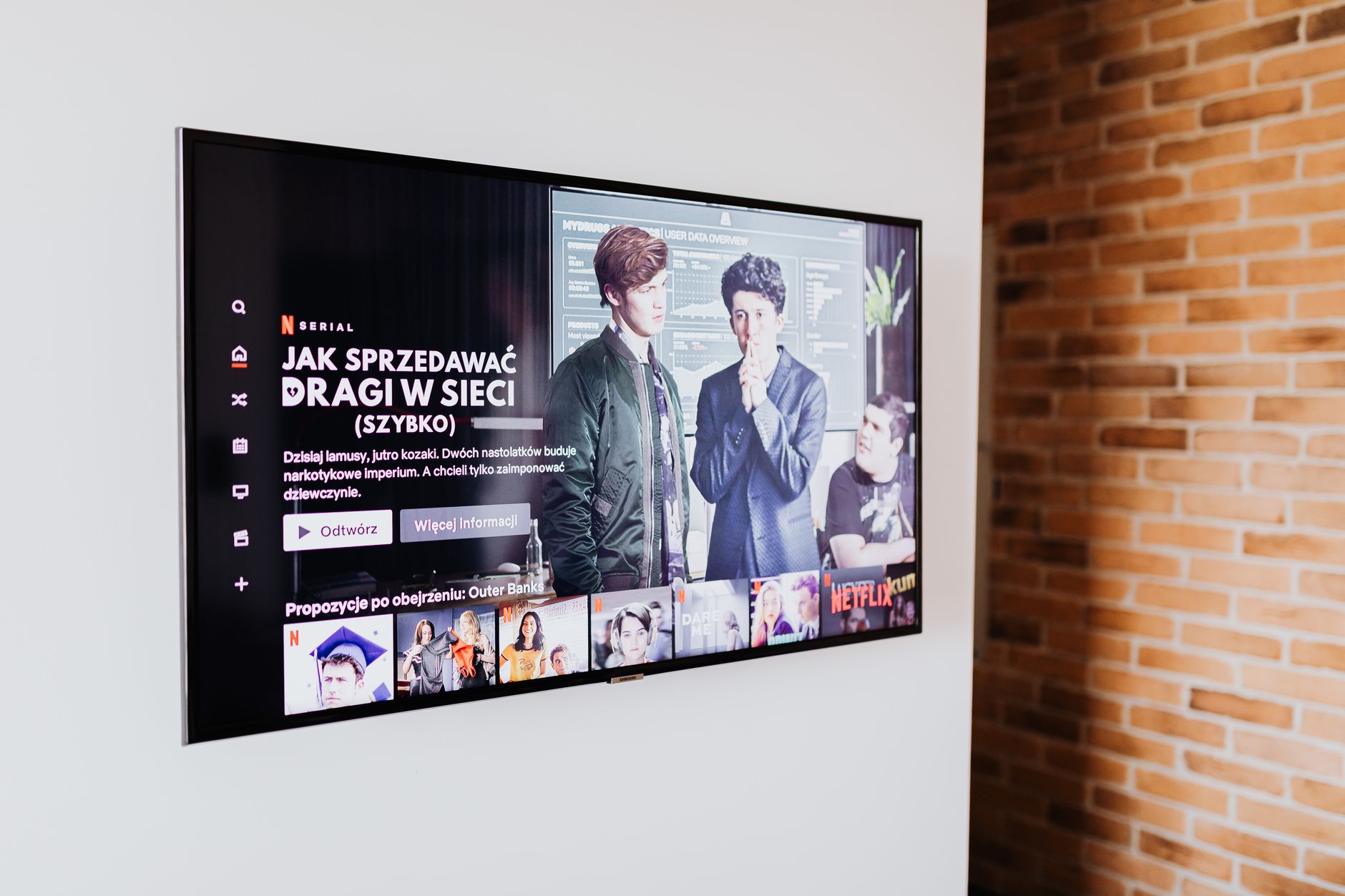 A family gathered around a television, discussing their favorite show, representing the social aspect of media consumption…