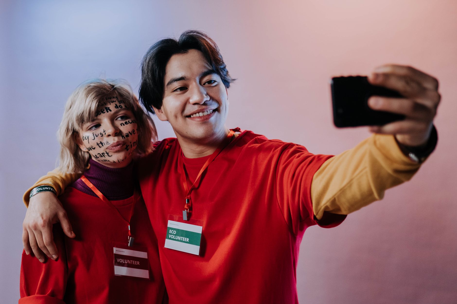 A photo of a celebrity using social media to promote a charitable cause, highlighting the connection between celebrity inf…