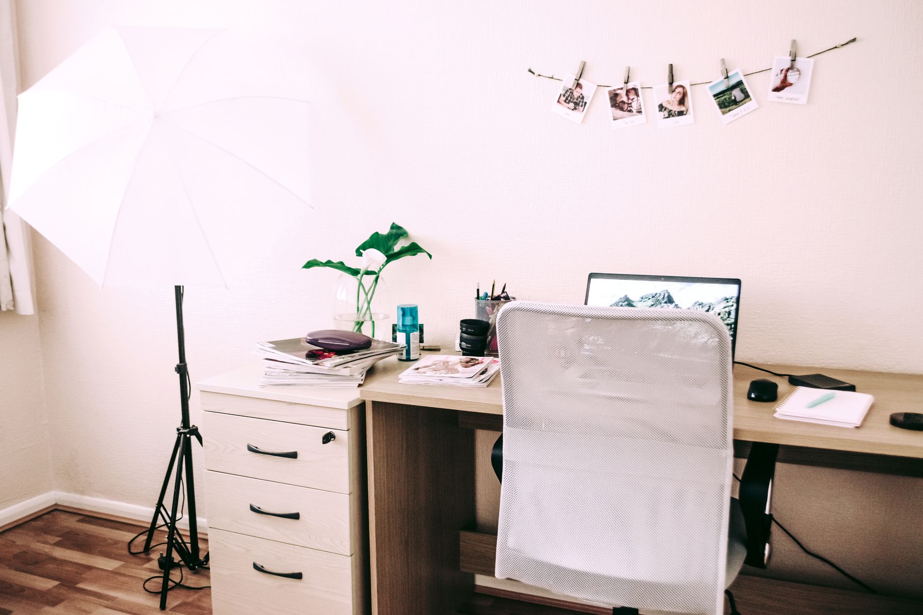 A photo of a home office setup illustrating the concept of the remote work debate.