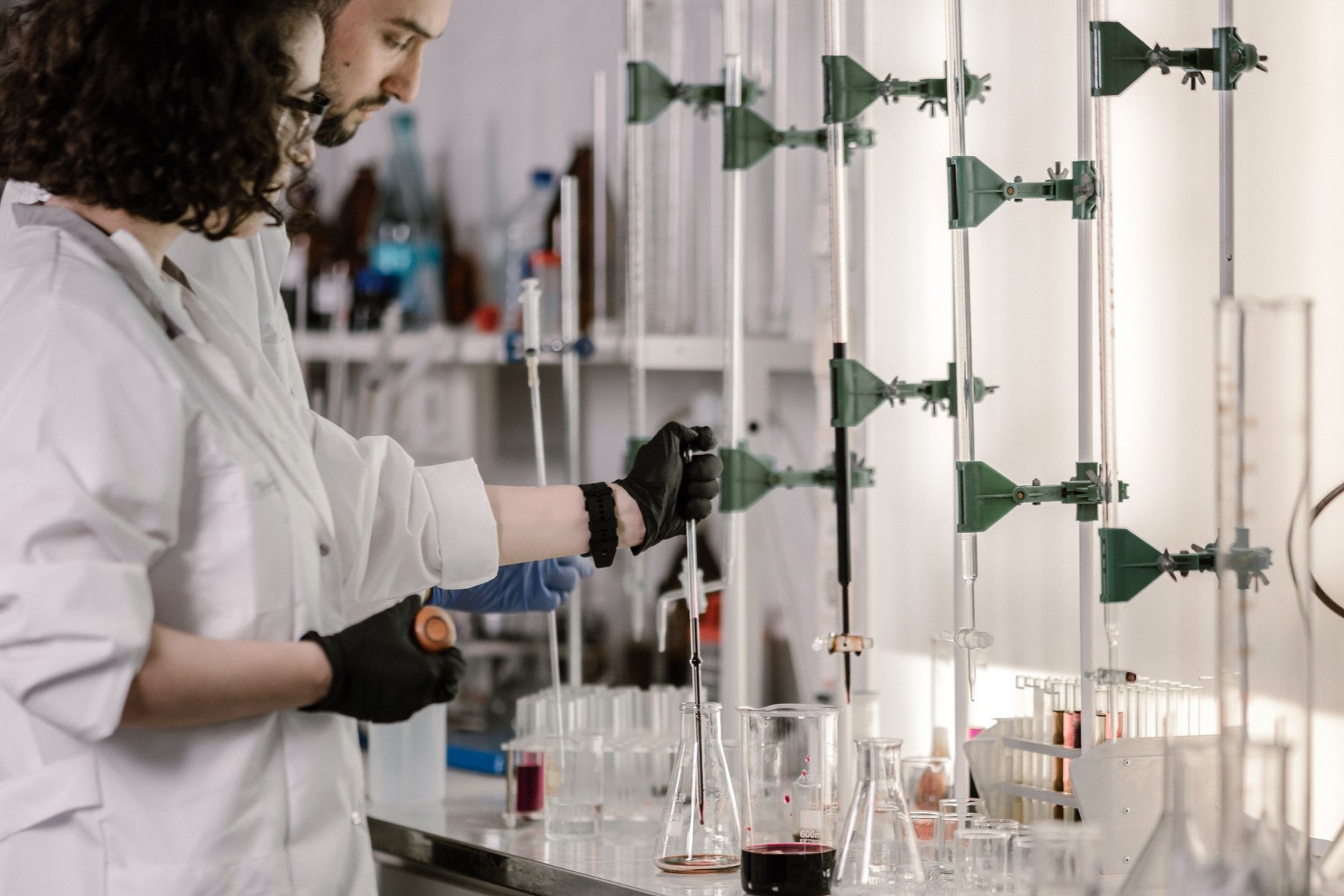 A photo of a laboratory setting with researchers working on animal models, showcasing the intersection of animal rights an…