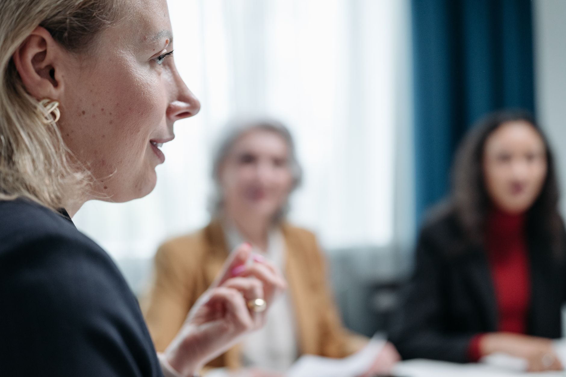 A photo of a moderator facilitating a debate, highlighting the role of leadership in online discussions. — social media …
