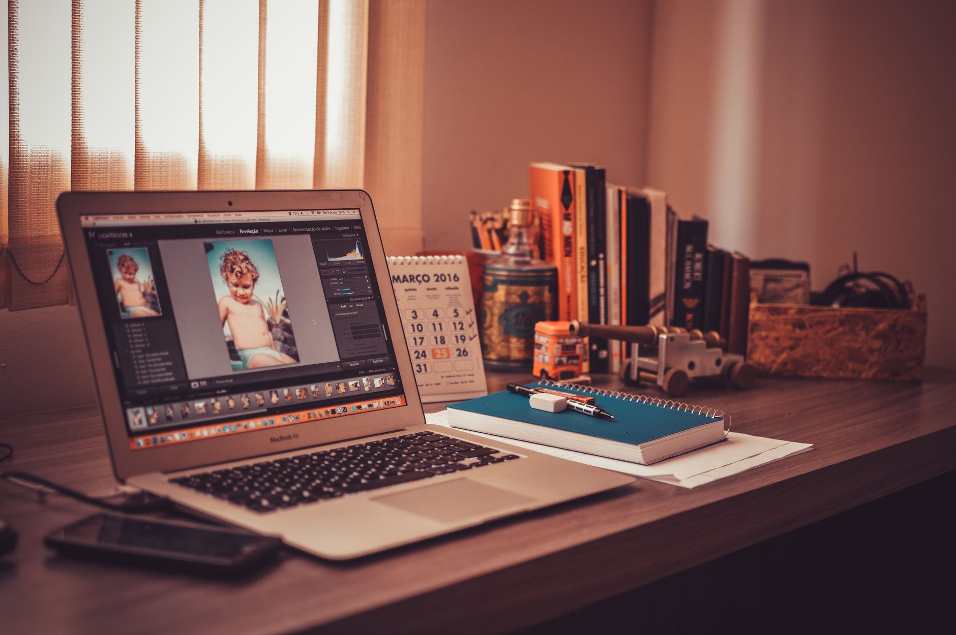 A photo of a modern home office setup showcasing remote work tools. — remote work debate