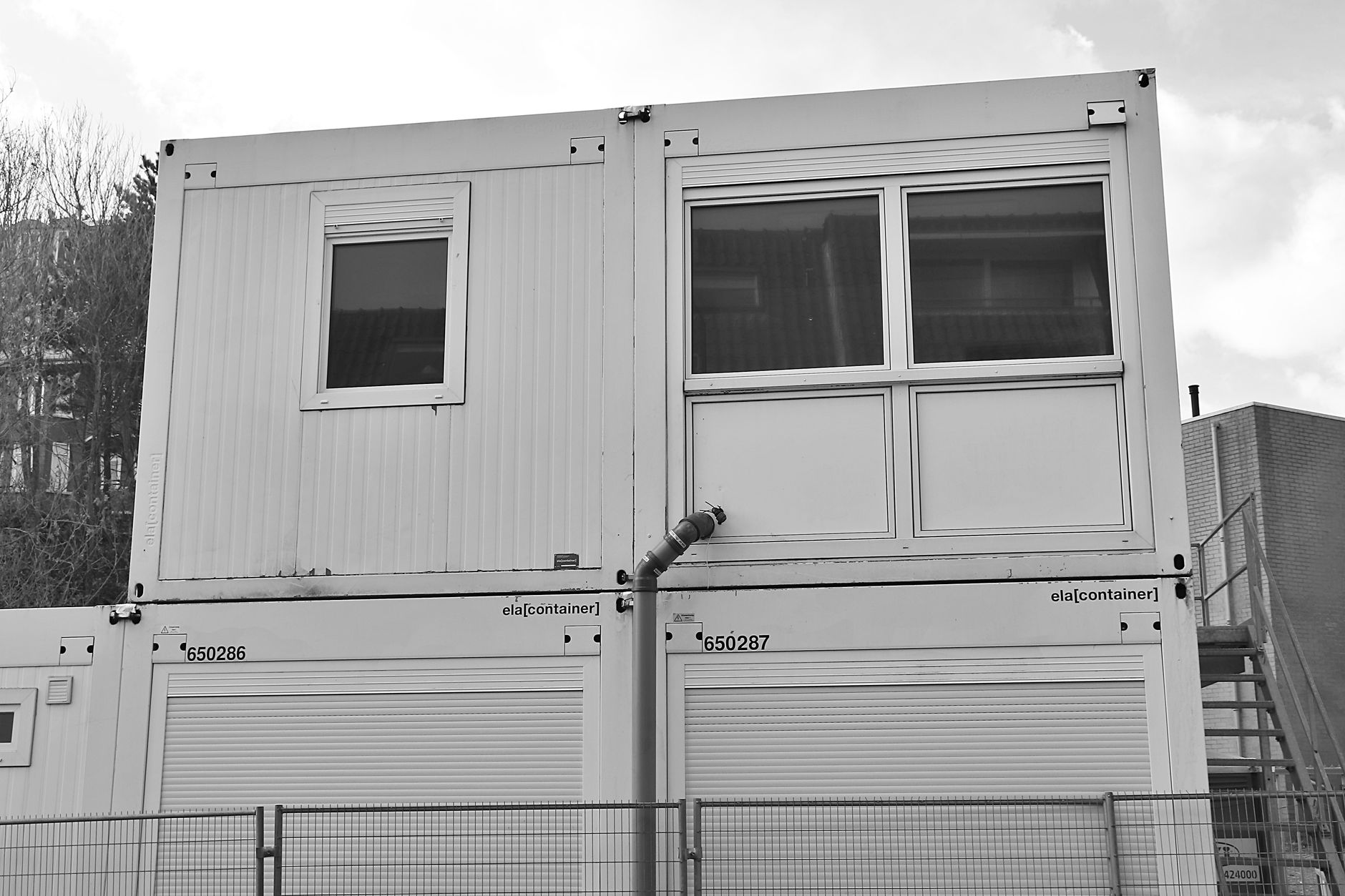 A photo of a modular home under construction, showcasing modern building techniques related to housing crisis solutions.