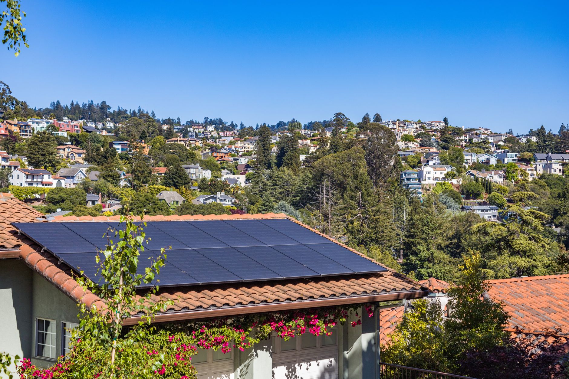 A photo of a solar panel installation in a residential area, showcasing renewable energy use in the renewable energy debate.