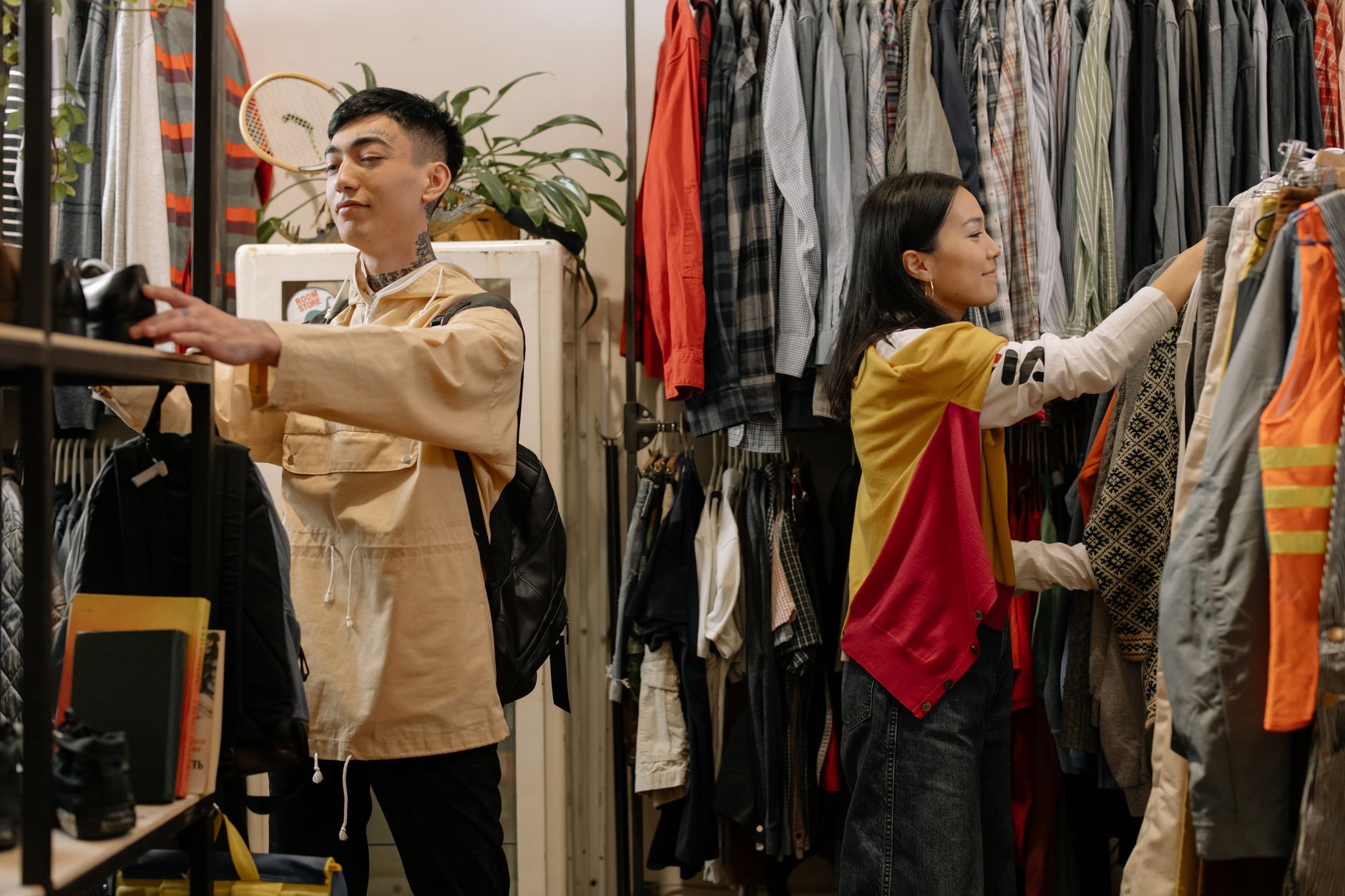 A photo of a thrift store or second-hand clothing shop, highlighting sustainable shopping choices. — fast fashion impact