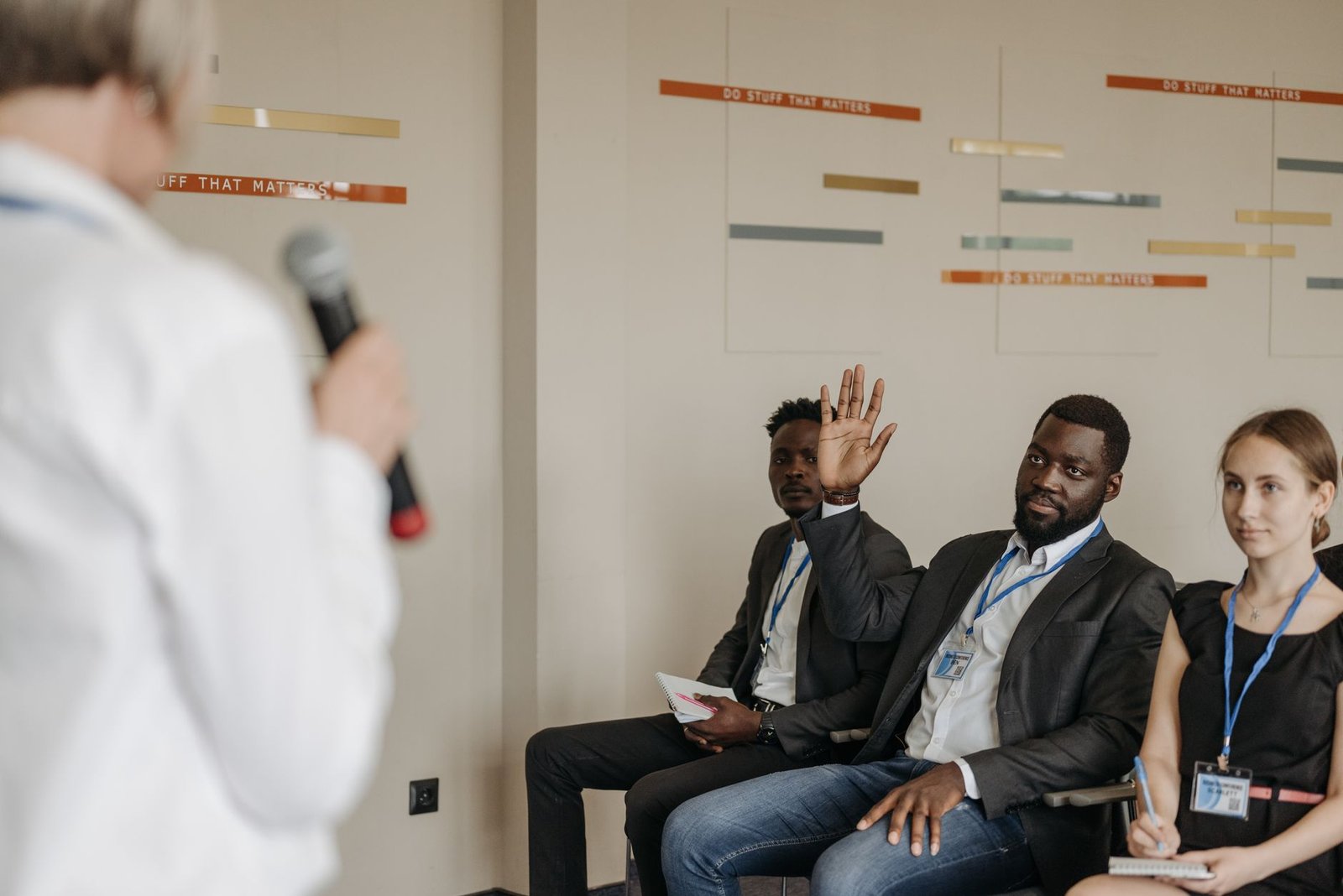 A public speaker engaging with an audience using effective argumentation techniques